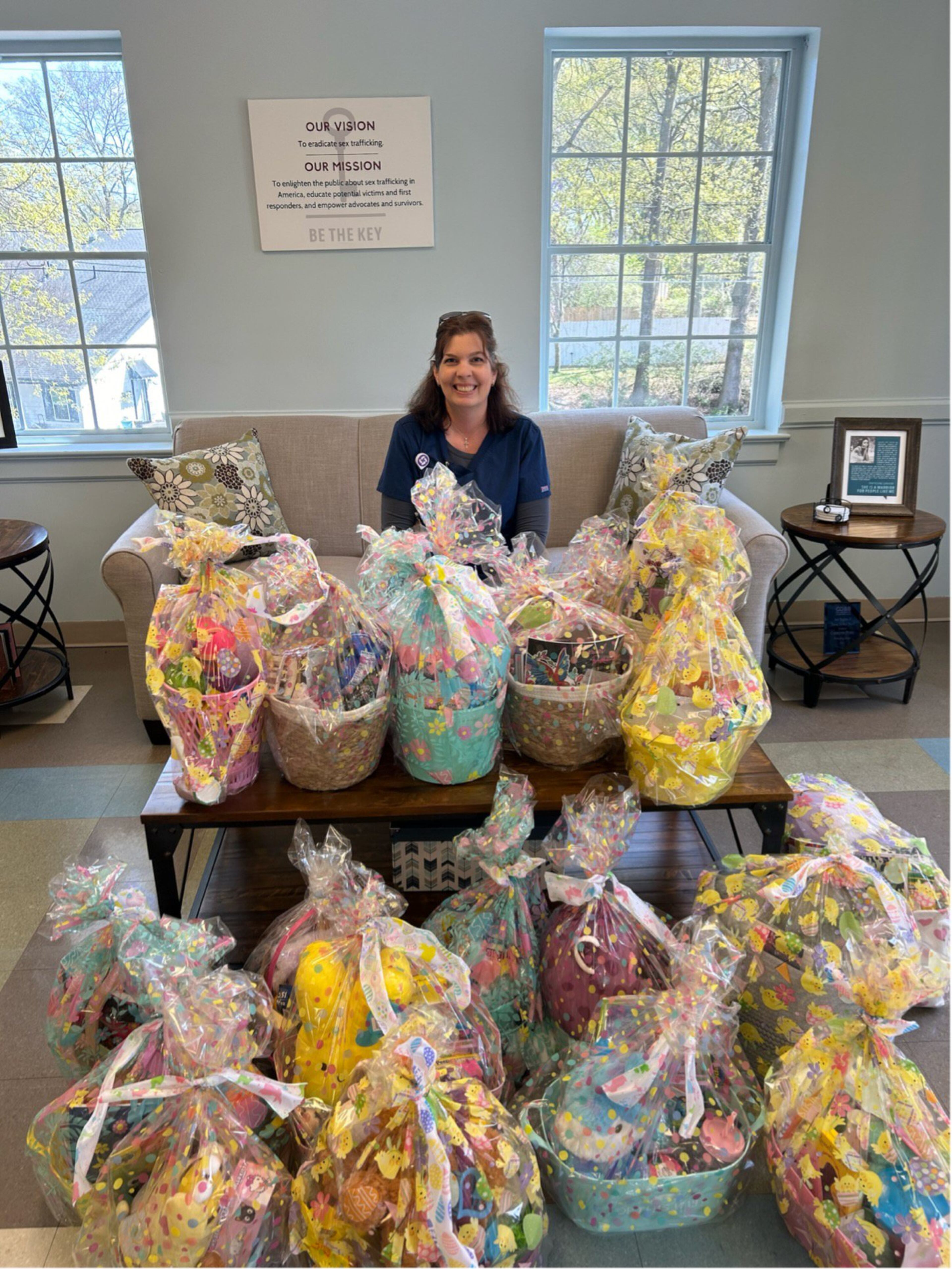 Jennifer Fisher leads a team of staff members who work in Wellstar Kennestone Regional Medical Center's Emergency Department and perform small acts of kindness throughout the year. Here, she shows a collection of Easter baskets heading to the organization Receiving Hope this year. Courtesy of Wellstar Kennestone Regional Medical Center