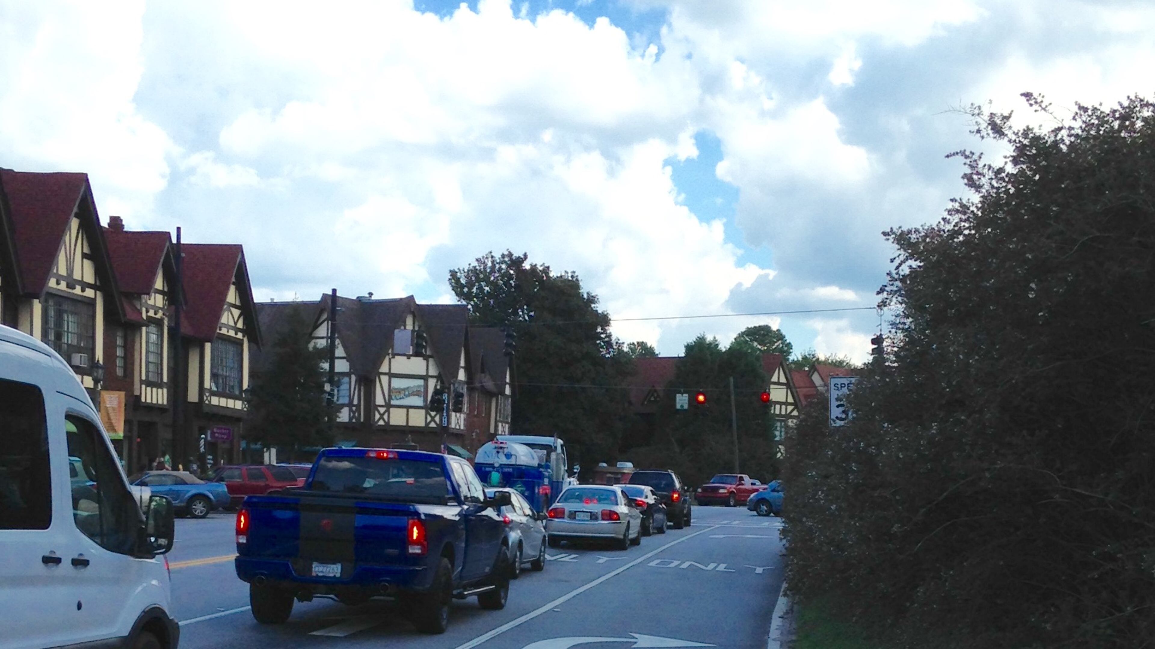 U.S. 278 heading east through Avondale Estates’ business district. City goals include building a series of traffic calming devices along this corridor, including reducing 278 from five (and in places four) lanes to three. Bill Banks file photo for the AJC