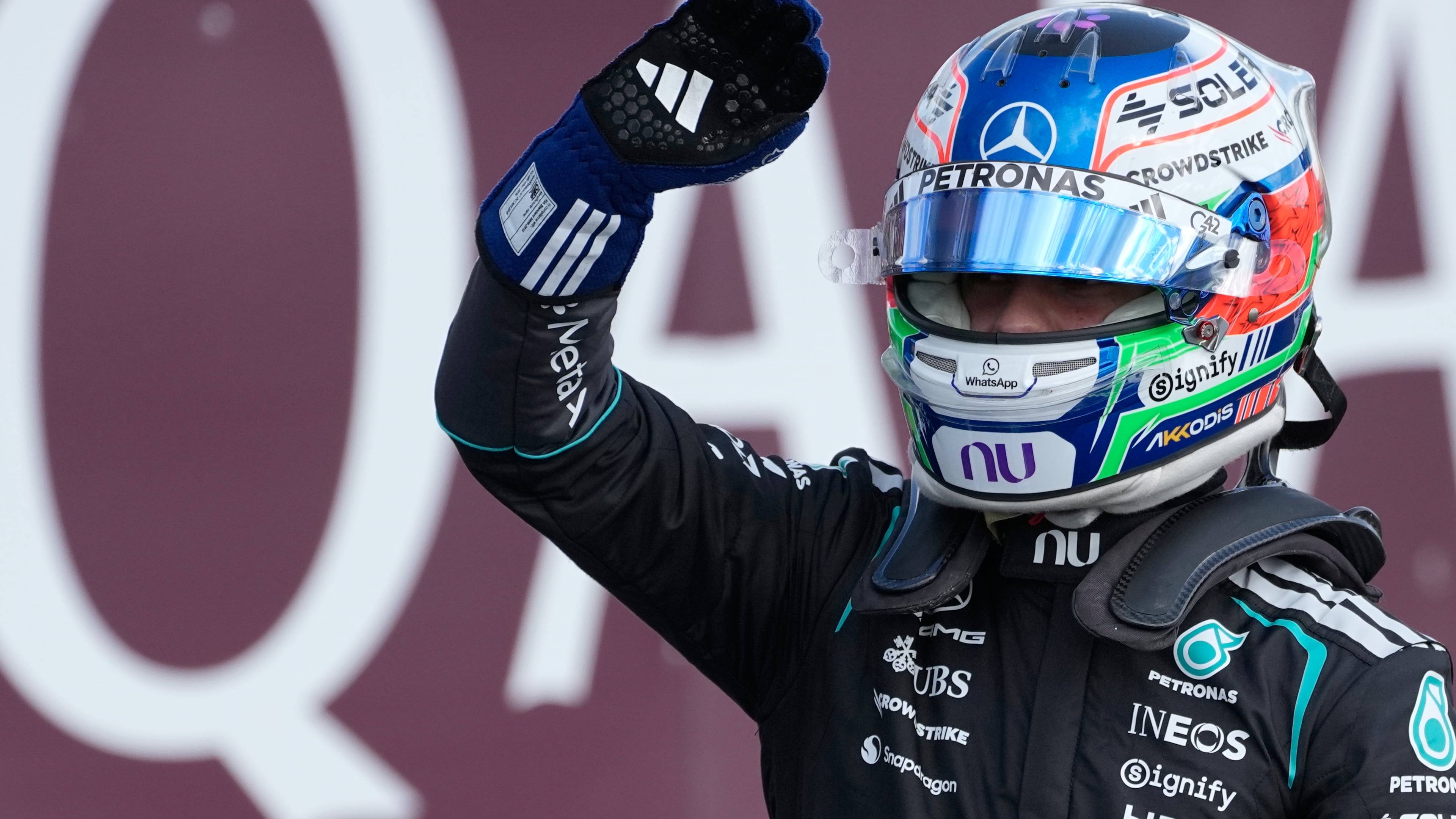 Mercedes driver Andrea Kimi Antonelli of Italy celebrates after clocked the fastest time during the qualifying session ahead of the British F1 Grand Prix, in Silverstone, England, Saturday, July 4, 2026. (AP Photo/Darko Bandic)