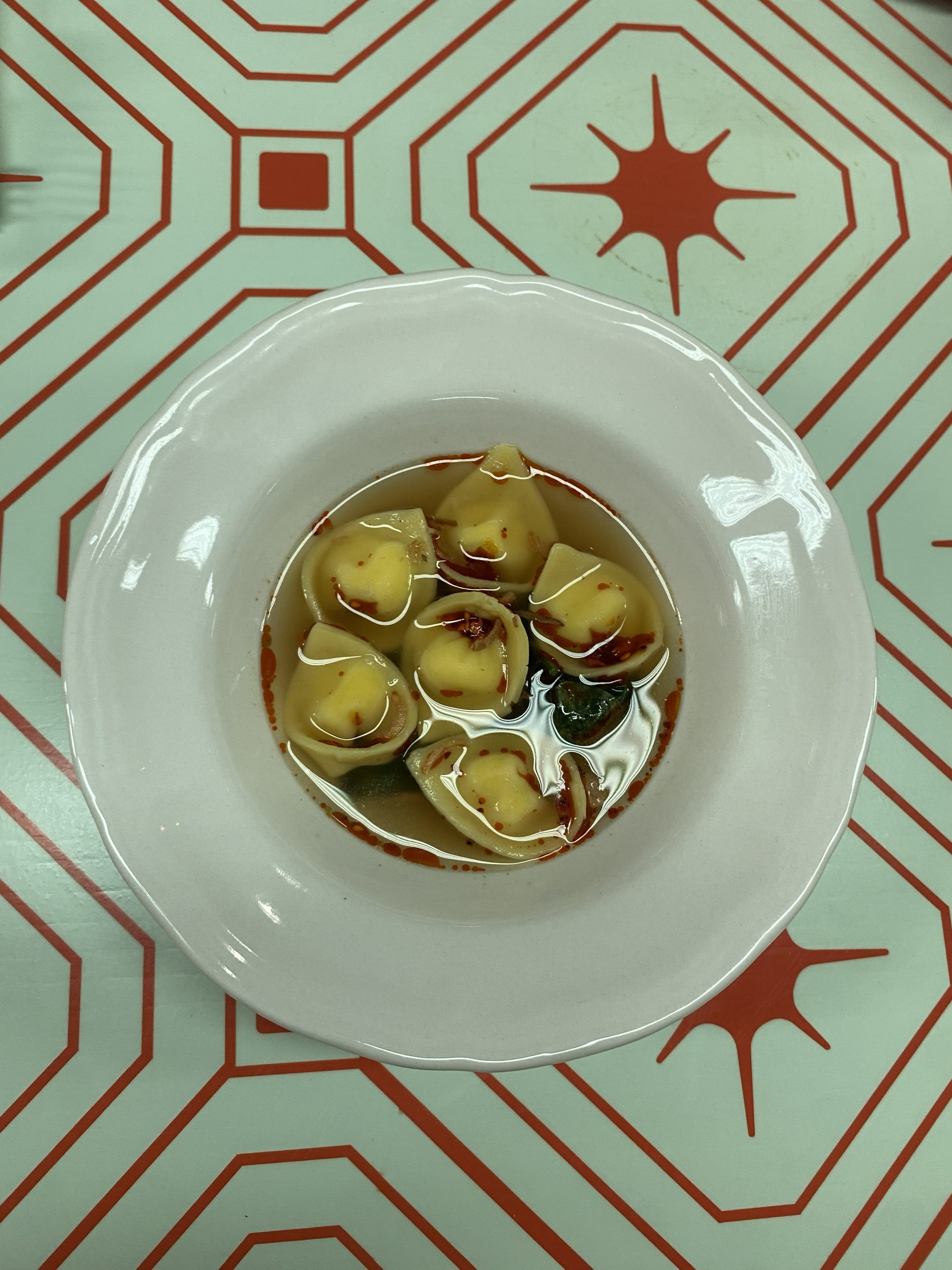 Eat.More.Dinna’s scallops with burnt curry butter, Swiss chard and coconut milk foam. (Courtesy of Eat.More.Dinna)