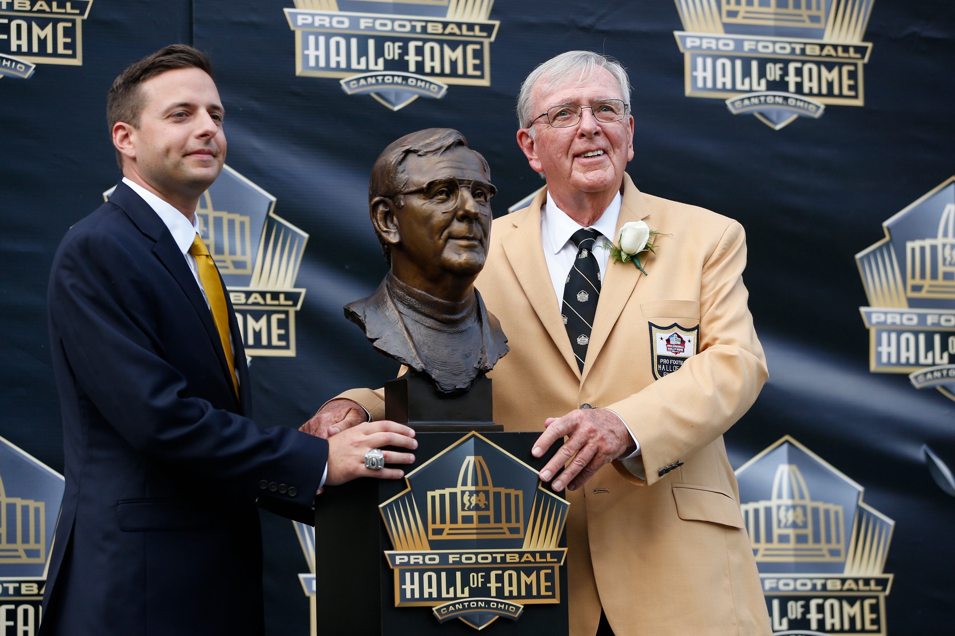 CANTON, OH - AUGUST 8: Ron Wolf and his son Eliot pose with Wolf's bust during the NFL Hall of Fame induction ceremony at Tom Benson Hall of Fame Stadium on August 8, 2015 in Canton, Ohio. (Photo by Joe Robbins/Getty Images)