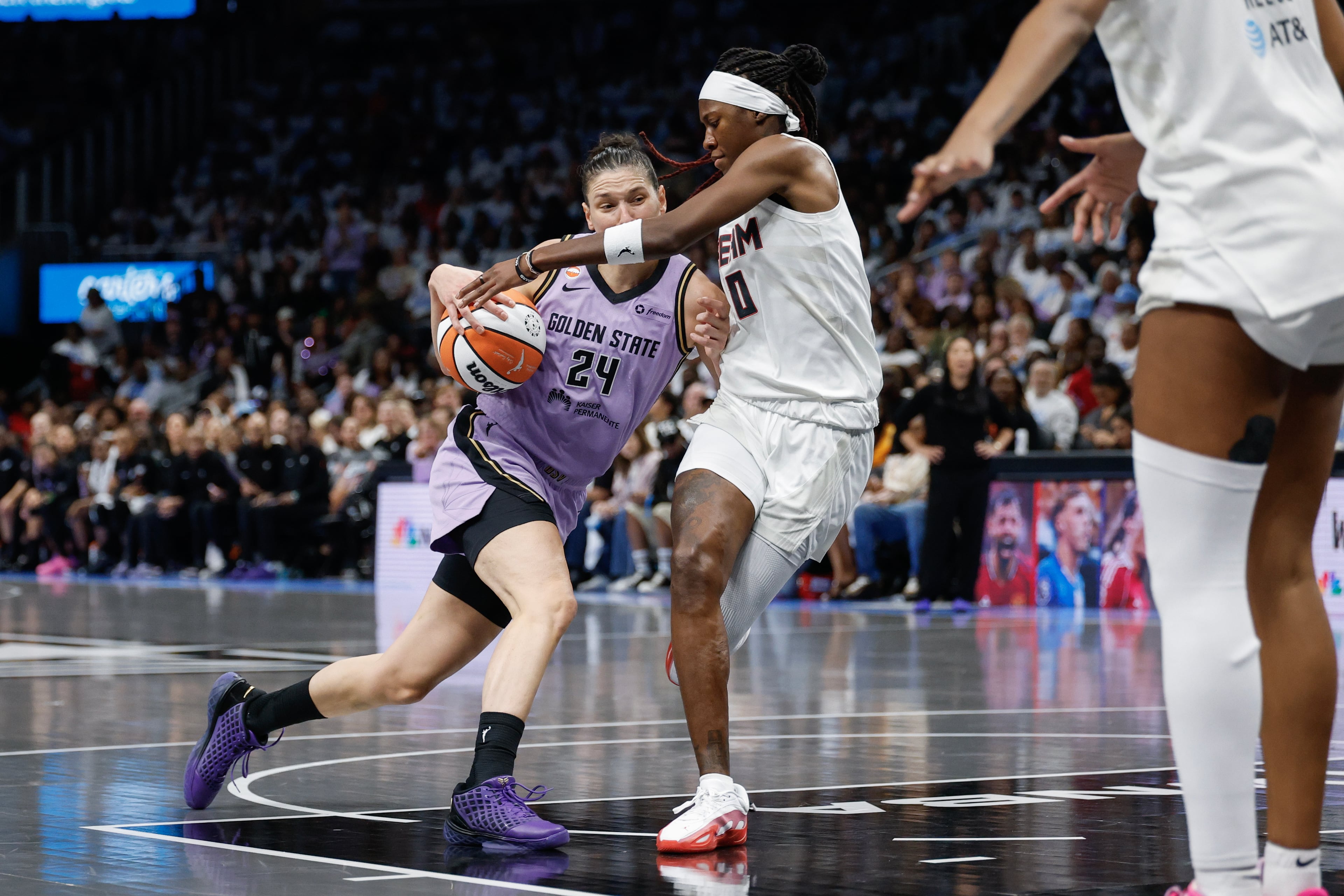 Golden State Valkyries forward Cecilia Zandalasini drives against Atlanta Dream guard Rhyne Howard during the first half of Game 4 of the WNBA Finals between the Atlanta Dream and the Golden State Valkyries, Saturday, Oct. 24, 2026, in Atlanta. (Erik S. Lesser for the AJC)