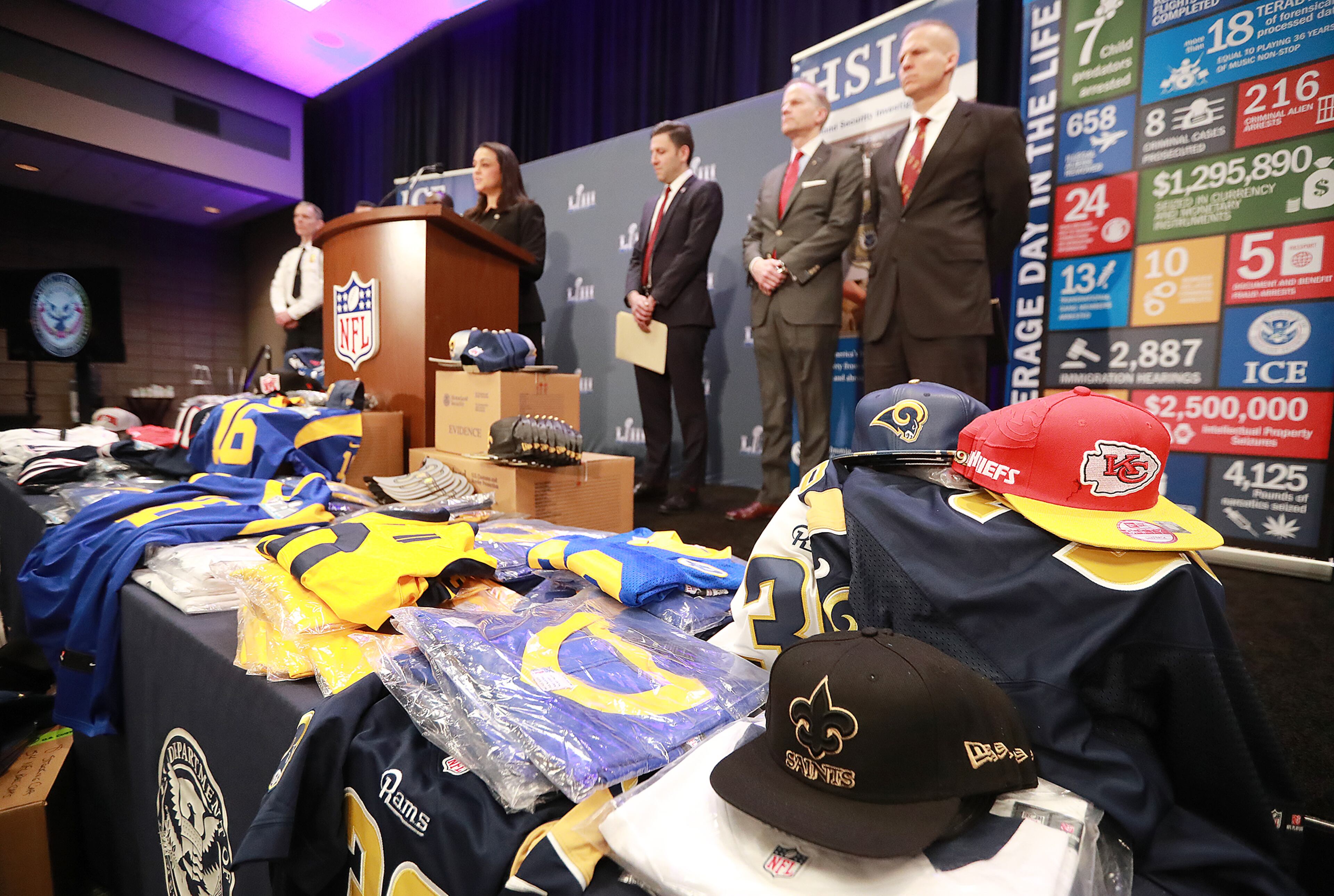 Jan. 31, 2019 Atlanta: Fake NFL merchandise covers a table as the National Football League and law enforcement agencies announce the latest results of seizures of counterfeit game-related merchandise and tickets during a press conference at the Georgia World Congress Center on Thursday, Jan. 31, 2019, in Atlanta. Curtis Compton/ccompton@ajc.com