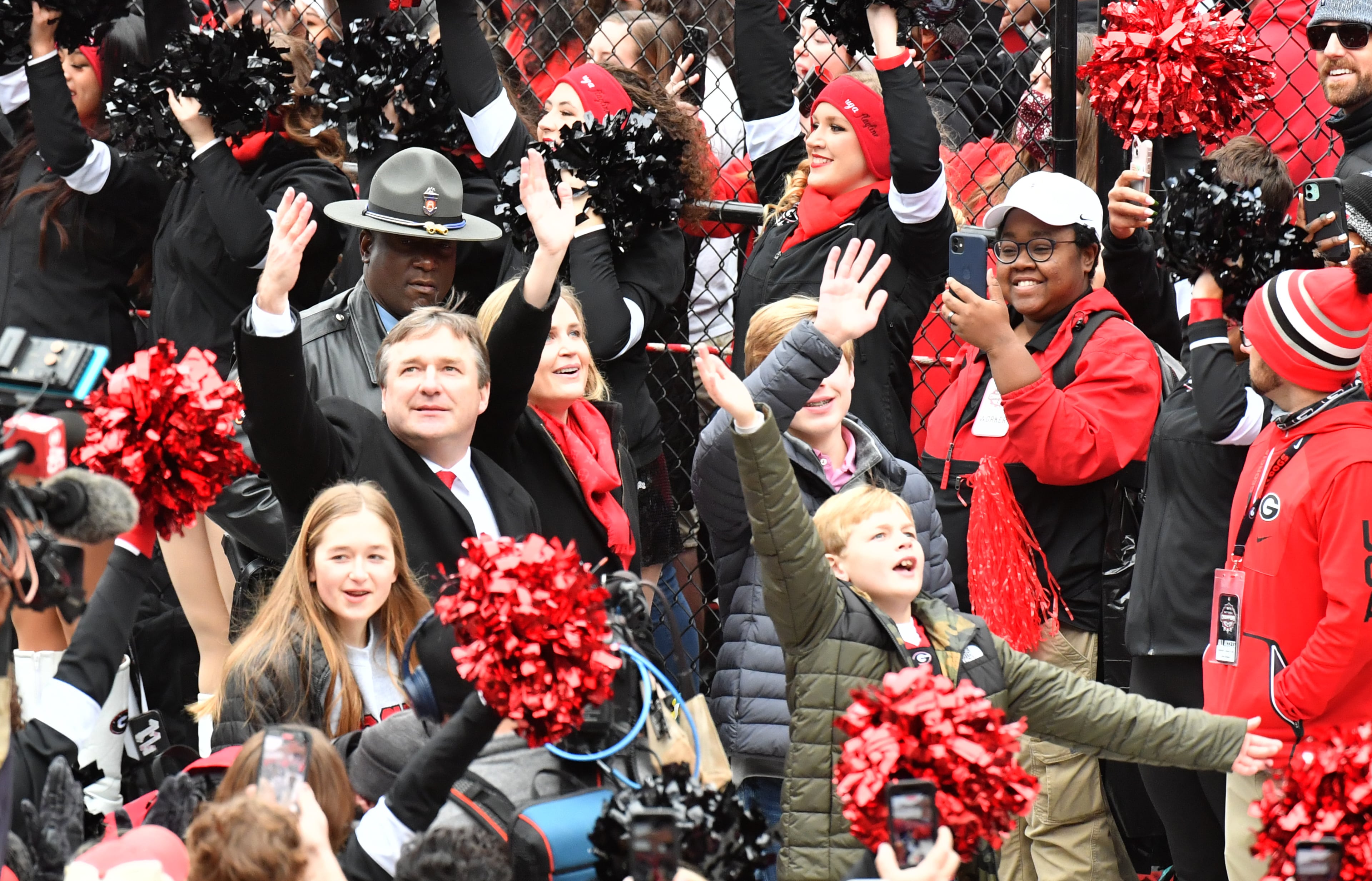 January 15, 2022 Athens - Georgia's head coach Kirby Smart and his family take in the DawgWalk during the celebration of Georgia’s College Football Playoff national championship at Sanford Stadium in Athens on Saturday, January 15, 2022. Georgia captured the national championship, its first since the 1980 season, with a 33-18 victory over Alabama at Lucas Oil Stadium in Indianapolis. (Hyosub Shin / Hyosub.Shin@ajc.com)