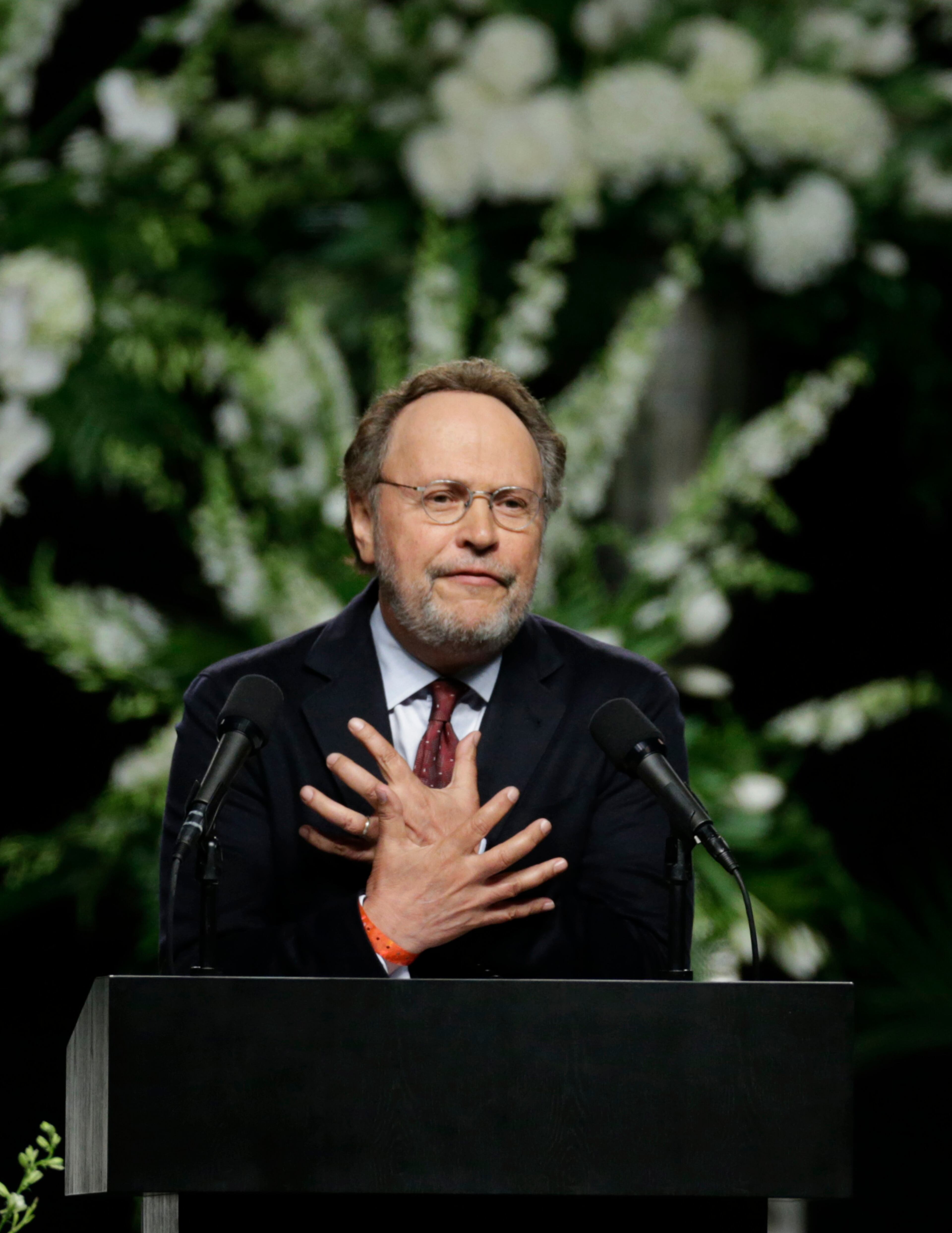 Comedian Billy Crystal delivers a eulogy during Muhammad Ali's memorial service, Friday, June 10, 2016, in Louisville, Ky. (AP Photo/David Goldman)