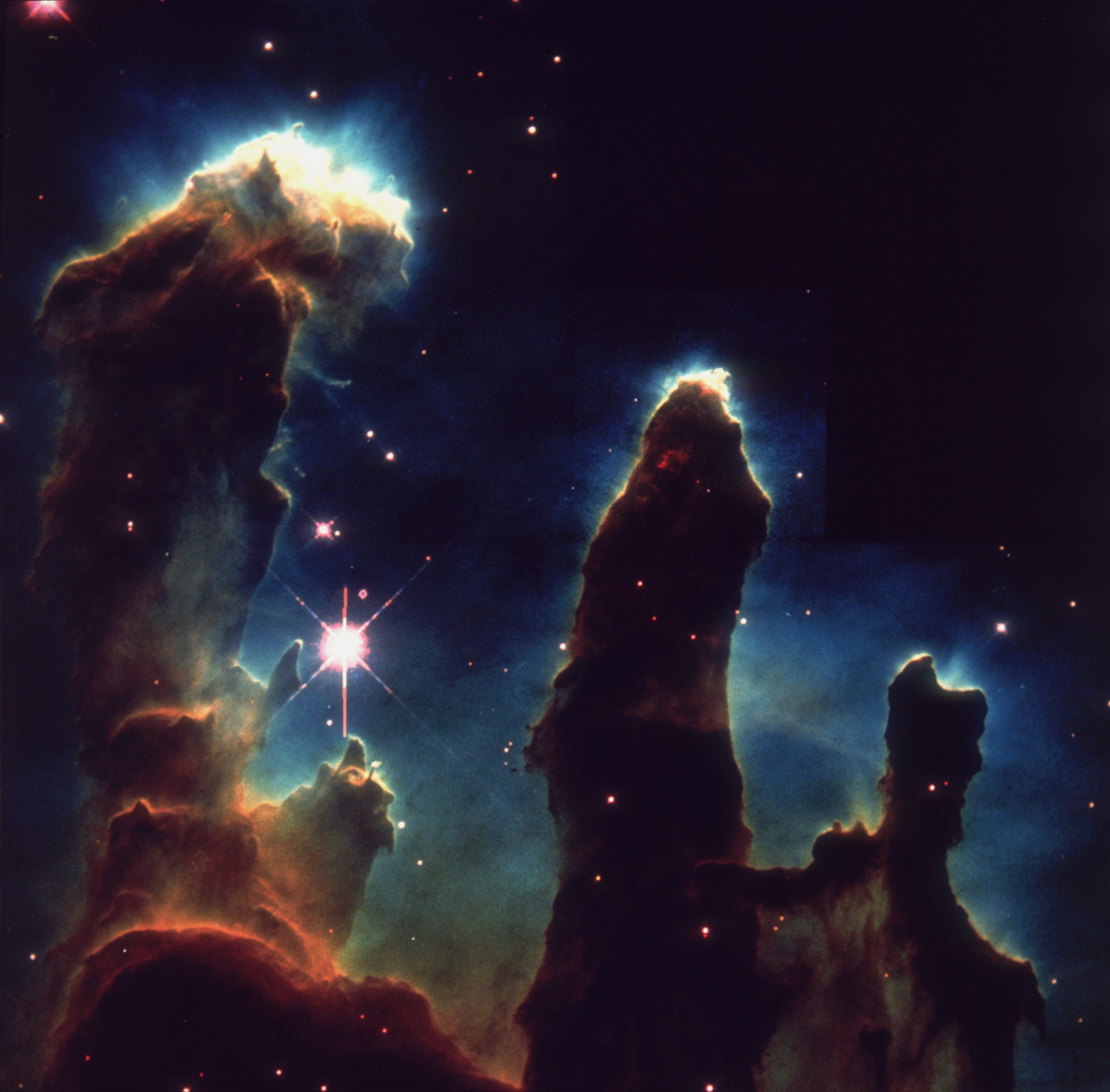 1st April 1995: An image taken via Hubble telescope entitled Pillars of Creation, depicting gaseous pillars in M16, the Eagle Nebula. These columns of hydrogen and dust act as incubators for new stars. (Photo by Space Frontiers/Hulton Archive/Getty Images)