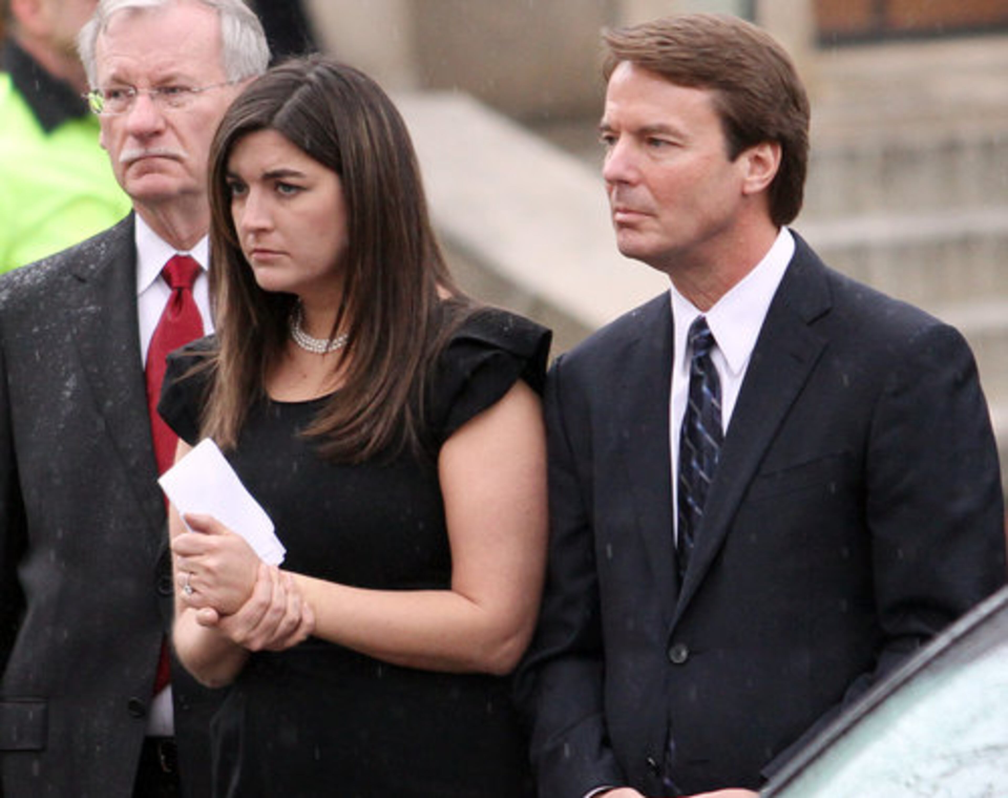 John Edwards and his daughter Cate leave the funeral service for Elizabeth Edwards at Edenton Street United Methodist Church in Raleigh, N.C., Saturday, Dec. 11, 2010. Family and friends of Elizabeth Edwards remembered her Saturday as a political sage, an idealistic law student and a mother who comforted her family even as she was dying of breast cancer.