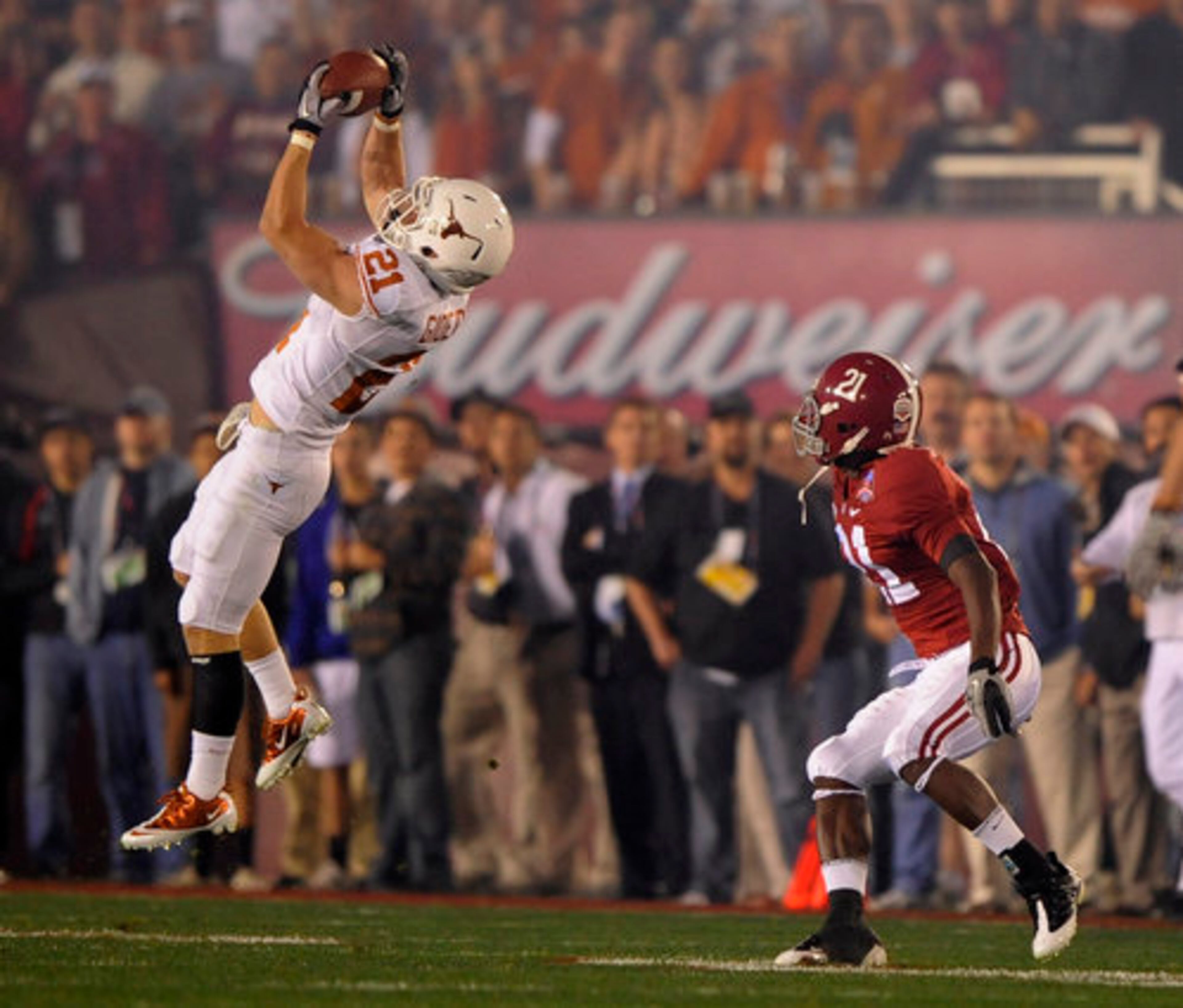 Alabama's Dre Kirkpatrick, right, watches as Texas safety Blake Gideon (21) intercepts a pass on a fake punt.