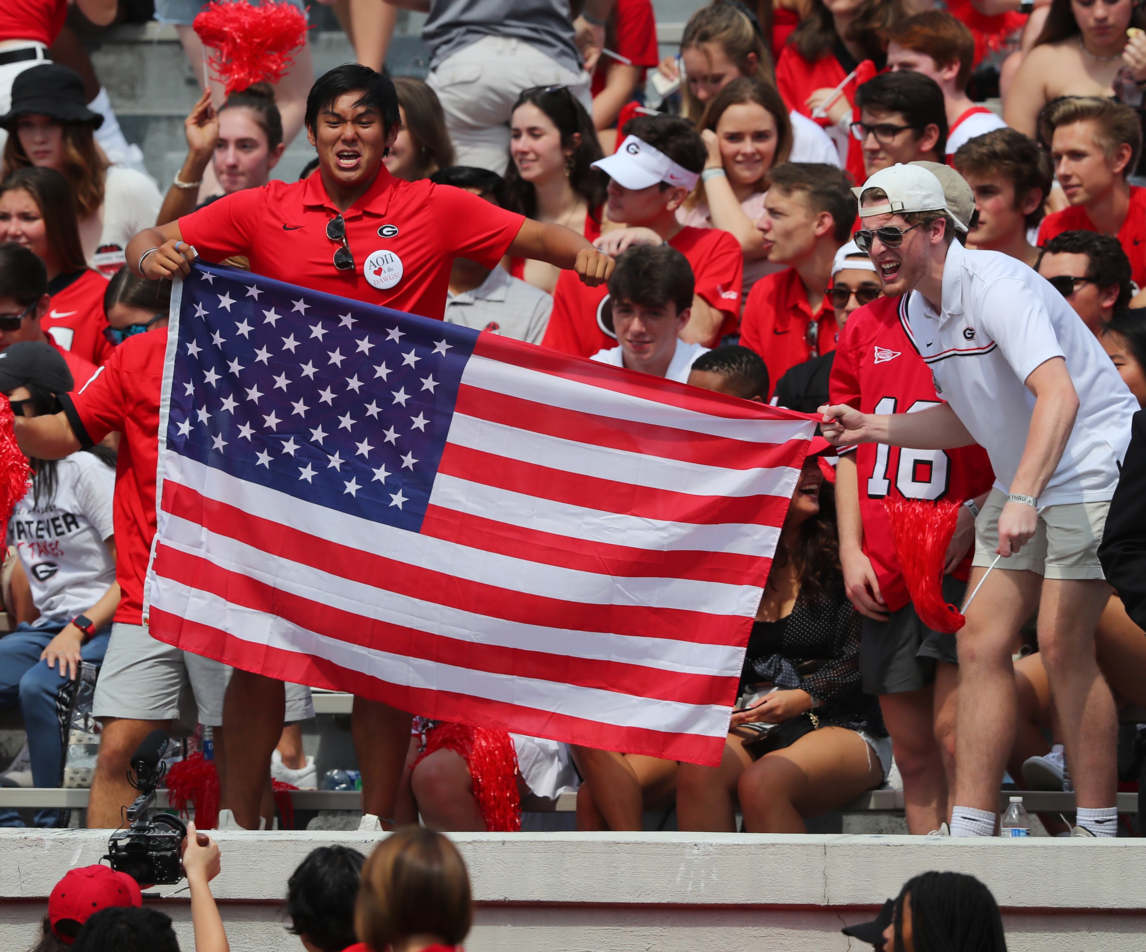 Georgia students show their patriotism with the American flag against UAB in a NCAA college football game on Saturday, Sept 11, 2021, in Atlanta. “Curtis Compton / Curtis.Compton@ajc.com”