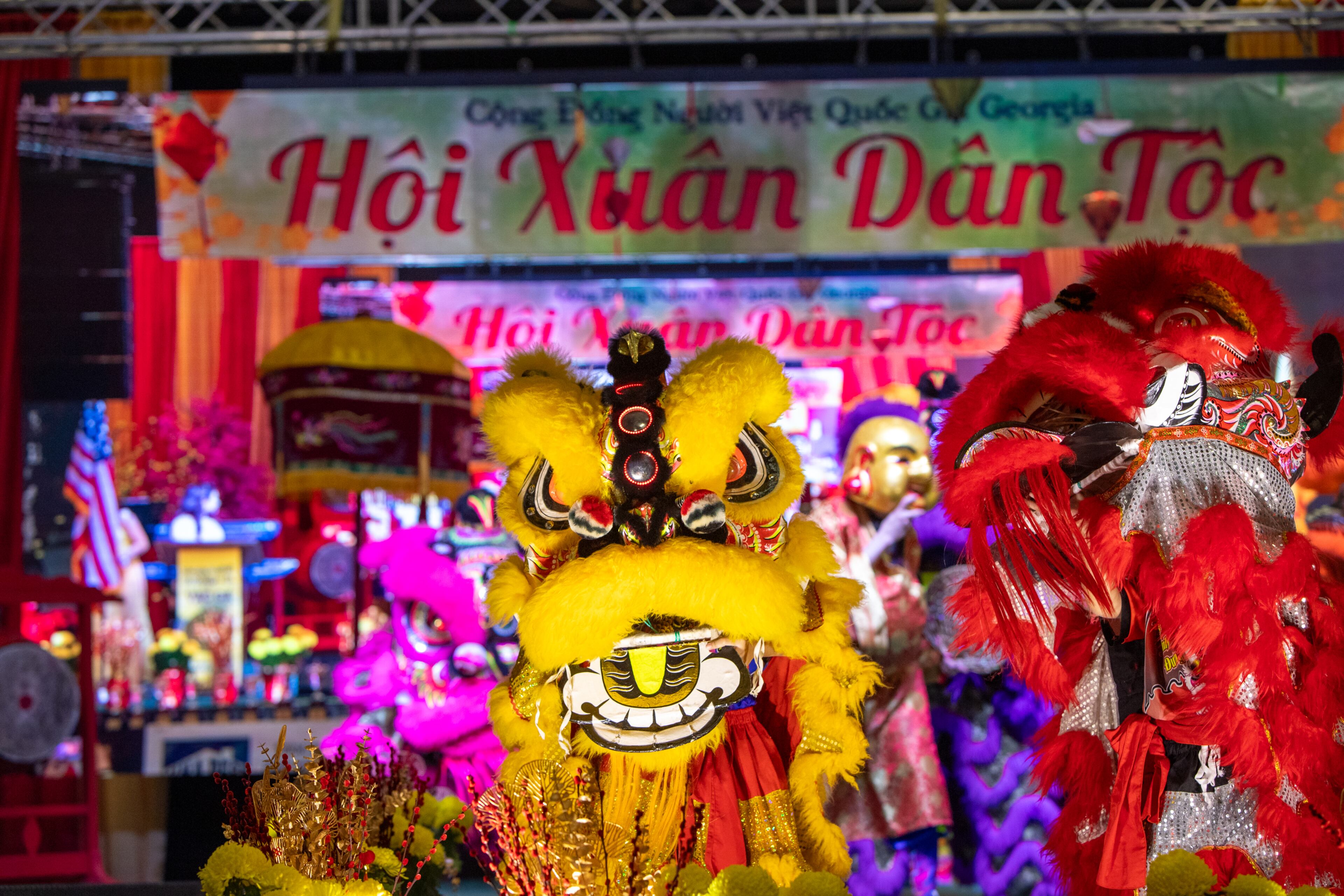 Lion dancers take the stage to open the Lunar New Year celebration, hosted by The Vietnamese American Community of Georgia, at Plaza Las Americas in Lilburn on Saturday, Feb 3, 2024 where dragon and lion dancing begins the weekend. The celebration continues on Sunday and includes traditional food, music and cultural festivities. (Jenni Girtman for The Atlanta Journal-Constitution)