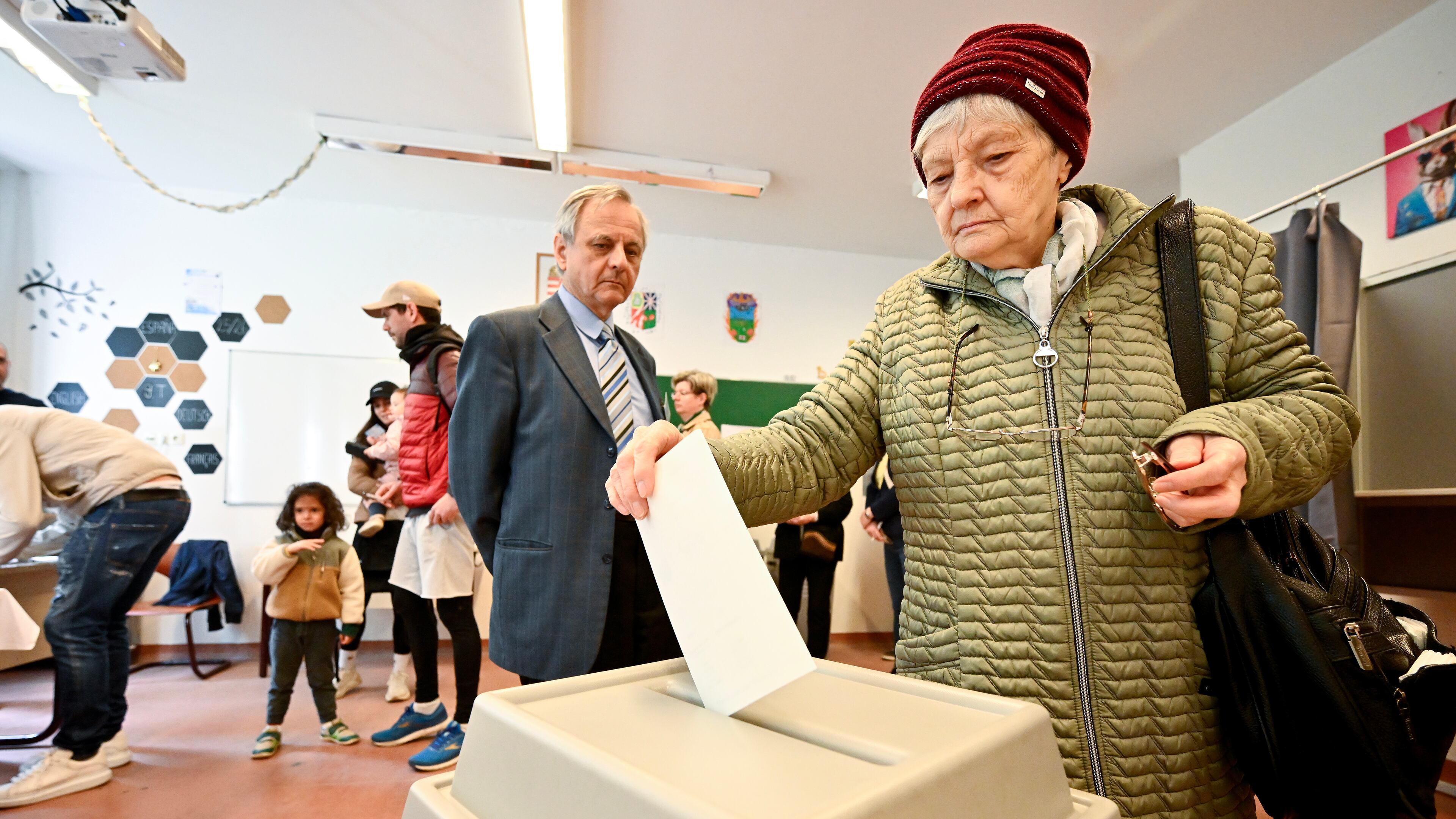 A woman casts her ballot at a polling station during the Hungarian parliamentary election in Budapest, Hungary, Sunday, April 12, 2026. (AP Photo/Denes Erdos)