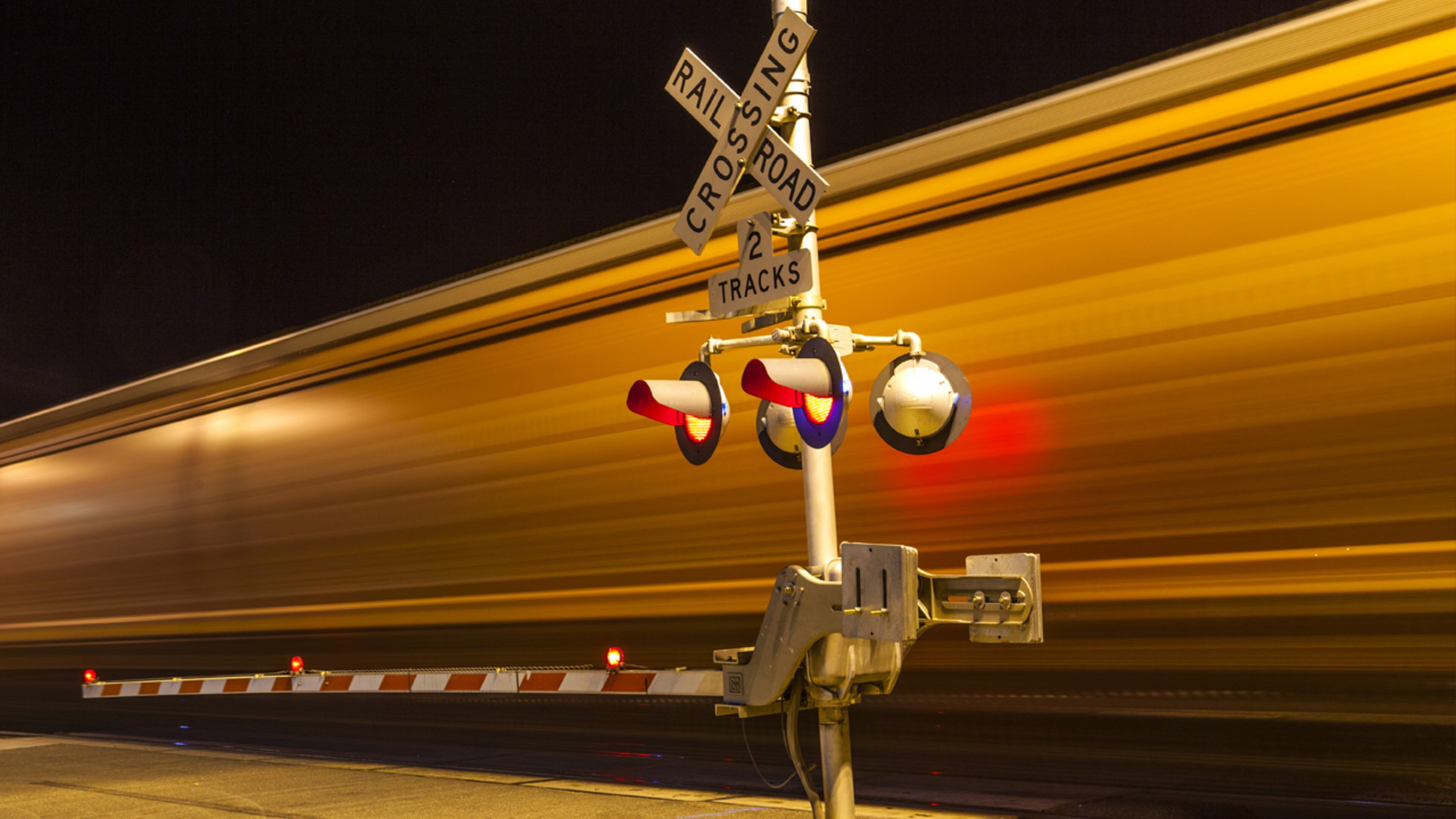 FILE PHOTO: A train almost hit a police officer's car when a rail crossing reportedly malfunctioned.