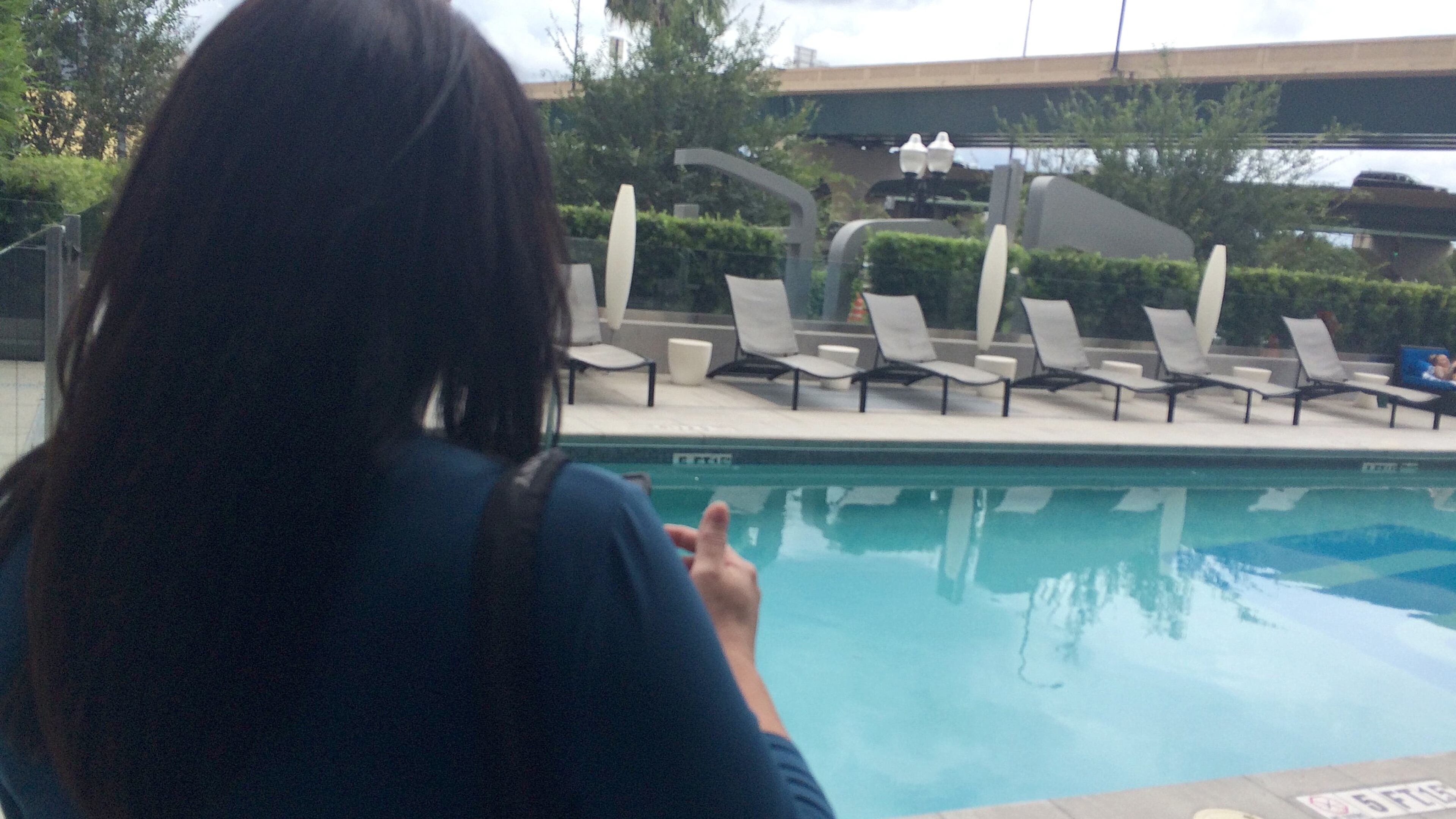 A Volusia County woman who has worked at AAA for three years as an inspector, visits Aloft Orlando Downtown on a recent afternoon for an hotel inspection. She writes what are supposed to be independent reviews for consumers. On this inspection, she visited the pool, survey the hotel rooms and lifted up the sheets on the bed to check for suspicious stains. Fortunately, there weren't any. (Gabrielle Russon/Orlando Sentinel/TNS)