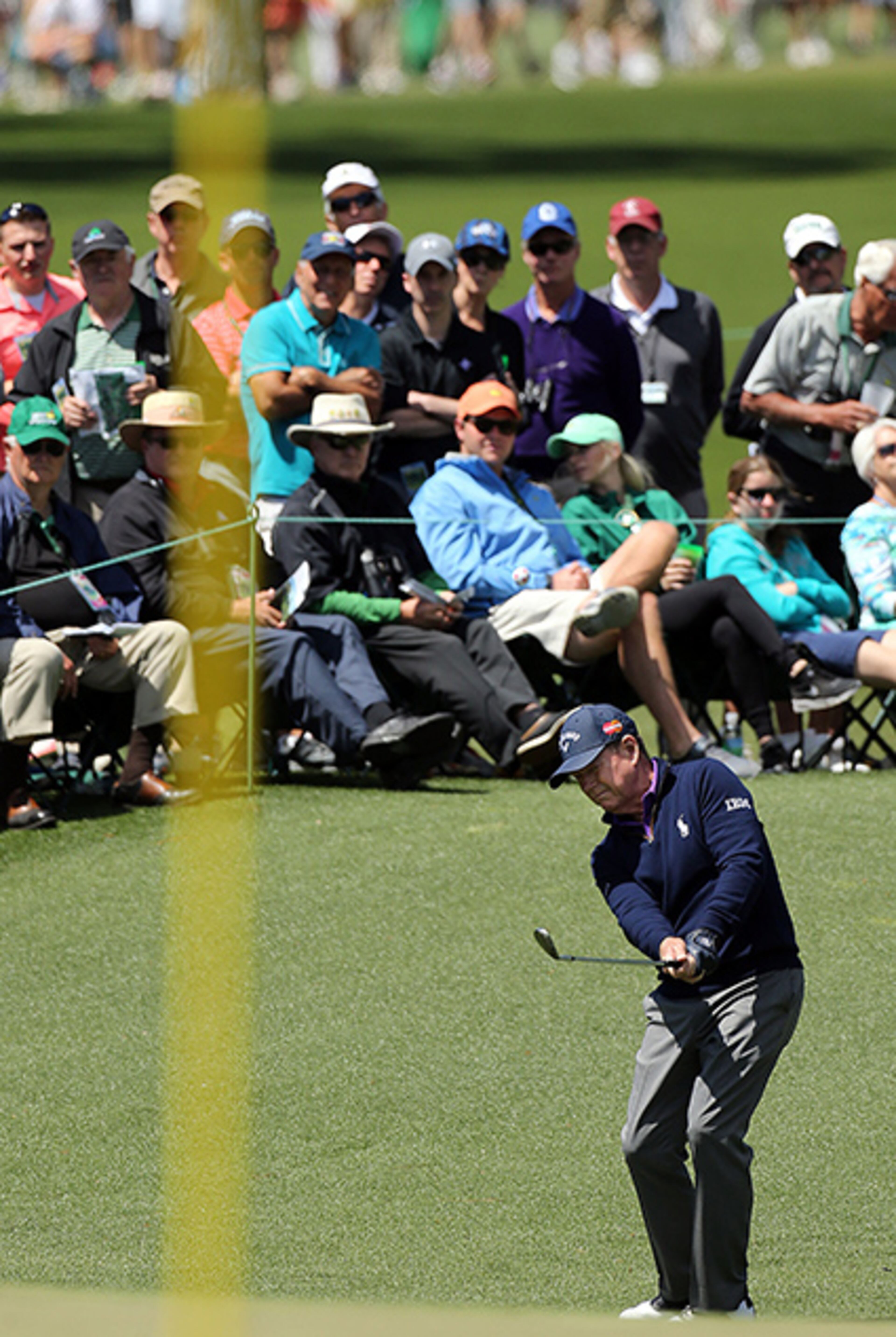 Tom Watson fires at the flag on the 2nd green during the second round of the 80th Masters at the Augusta National Golf Club, Friday, April 8, 2016. This is Watson's final Masters.