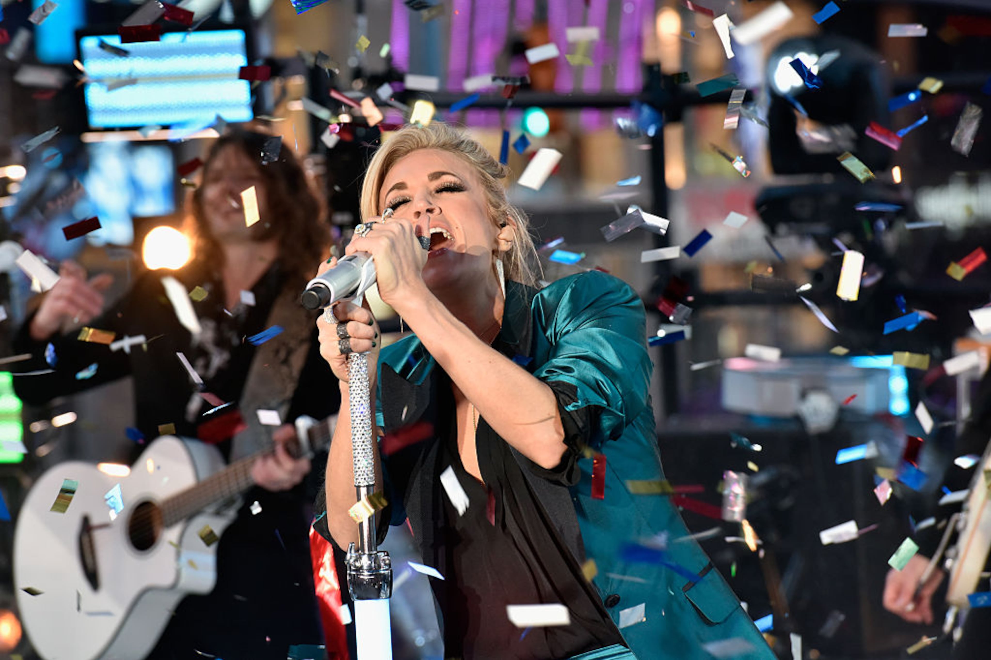 NEW YORK, NY - DECEMBER 31: Carrie Underwood performs during New Year's Eve celebrations at Times Square on December 31, 2015 in New York City. (Photo by Eugene Gologursky/Getty Images for TOSHIBA CORPORATION)