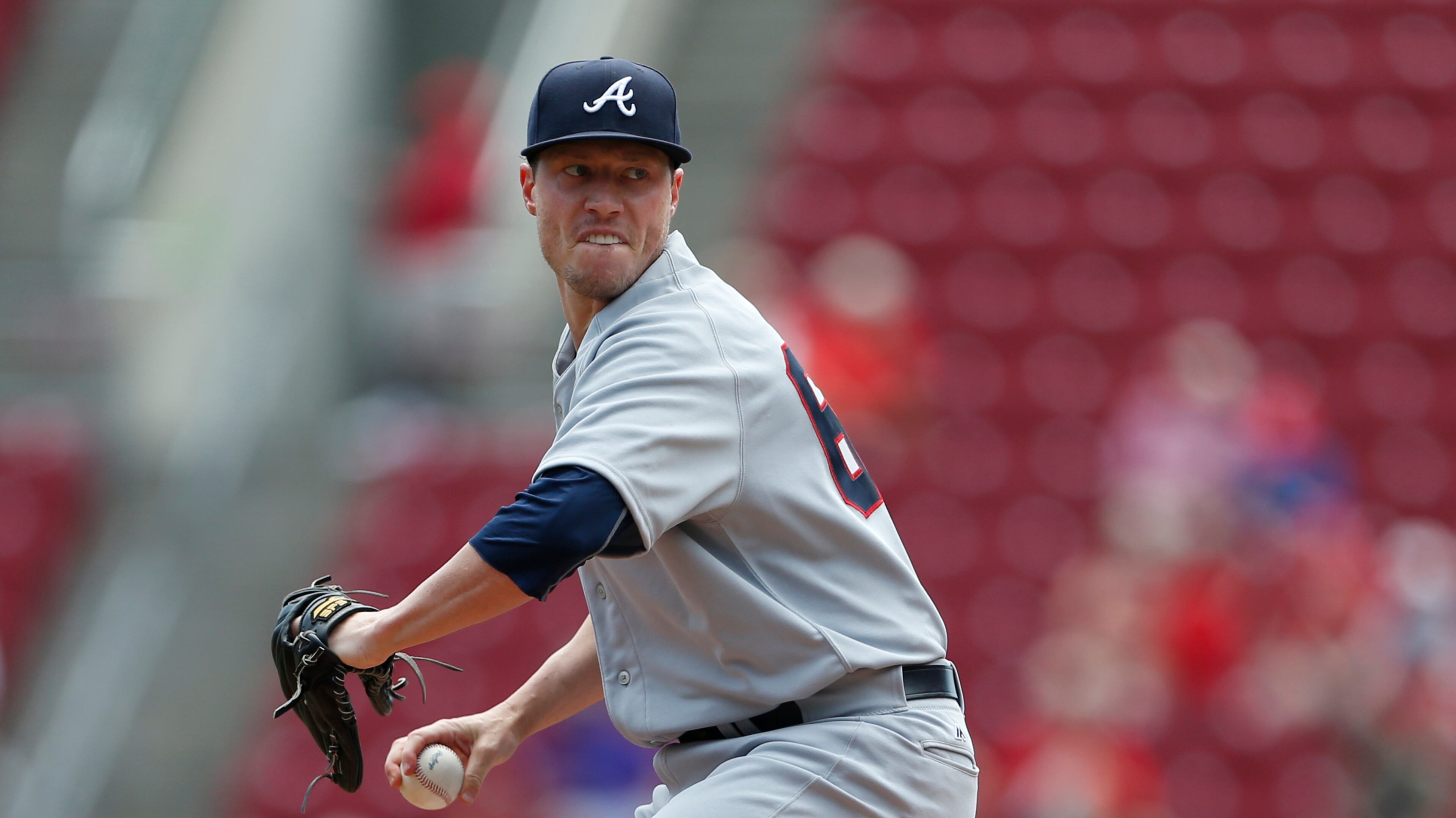 Atlanta Braves starting pitcher Lucas Harrell throws against the Cincinnati Reds during the first inning of a baseball game, Wednesday, July 20, 2016, in Cincinnati. (AP Photo/Gary Landers)