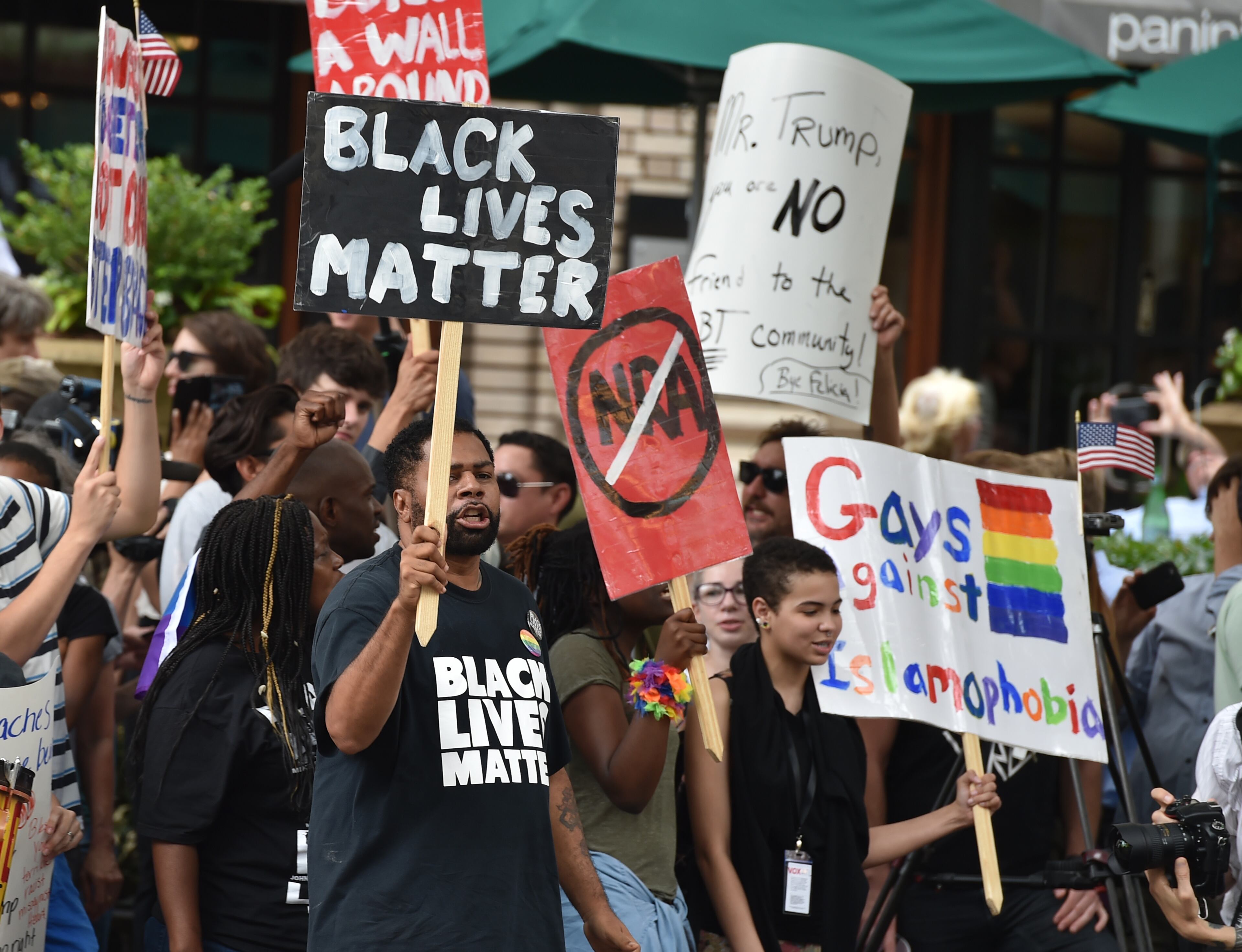 Protestors outside the Donald Trump rally at the Fox Theater. The Republican presidential nominee is holding a rally at the historical Fox Theater Wednesday June 15, 2016. BRANT SANDERLIN/BSANDERLIN@AJC.COM