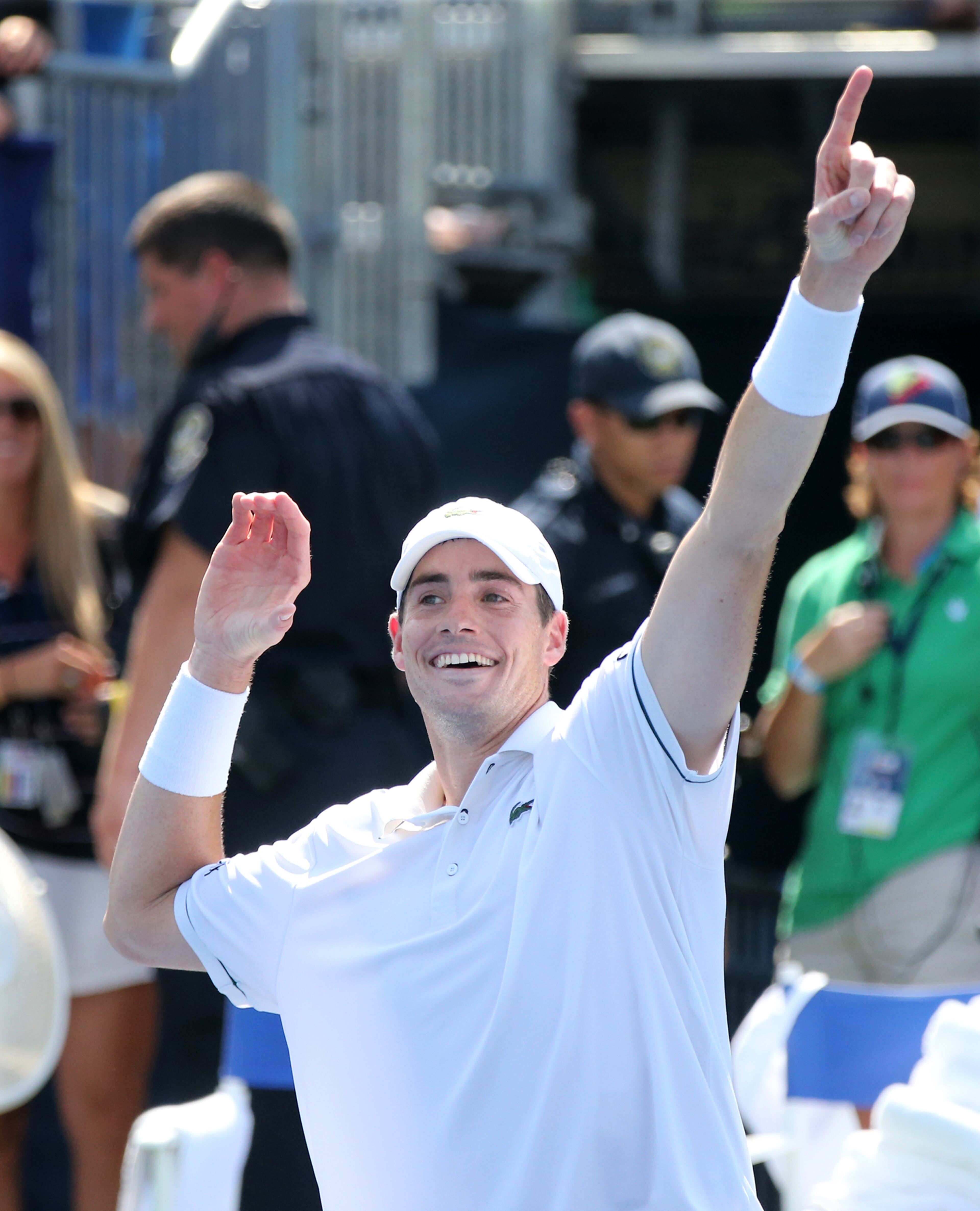-- THREE PEAT -- John Isner, USA, strikes a victory pose for the fans as he defeats Marcos Baghdatis, Cypress, to win his third consecutive BB&T Atlanta Open Singles Final on Sunday, August 2, 2015, in Atlanta. Curtis Compton / ccompton@ajc.com
