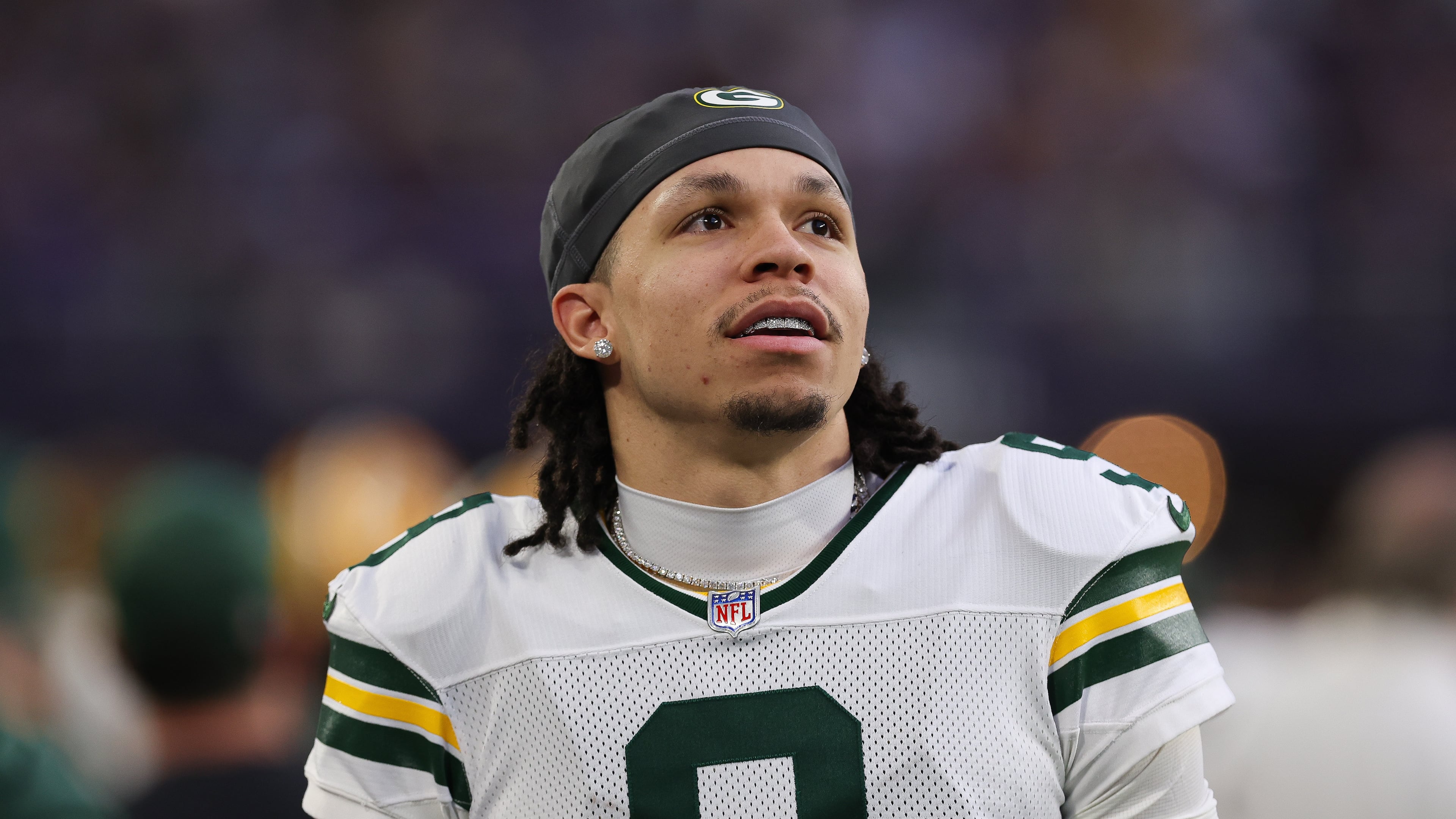 FILE - Green Bay Packers wide receiver Christian Watson looks on during the first half of an NFL football game against the Minnesota Vikings, Jan. 4, 2026 in Minneapolis. (AP Photo/Stacy Bengs, File)