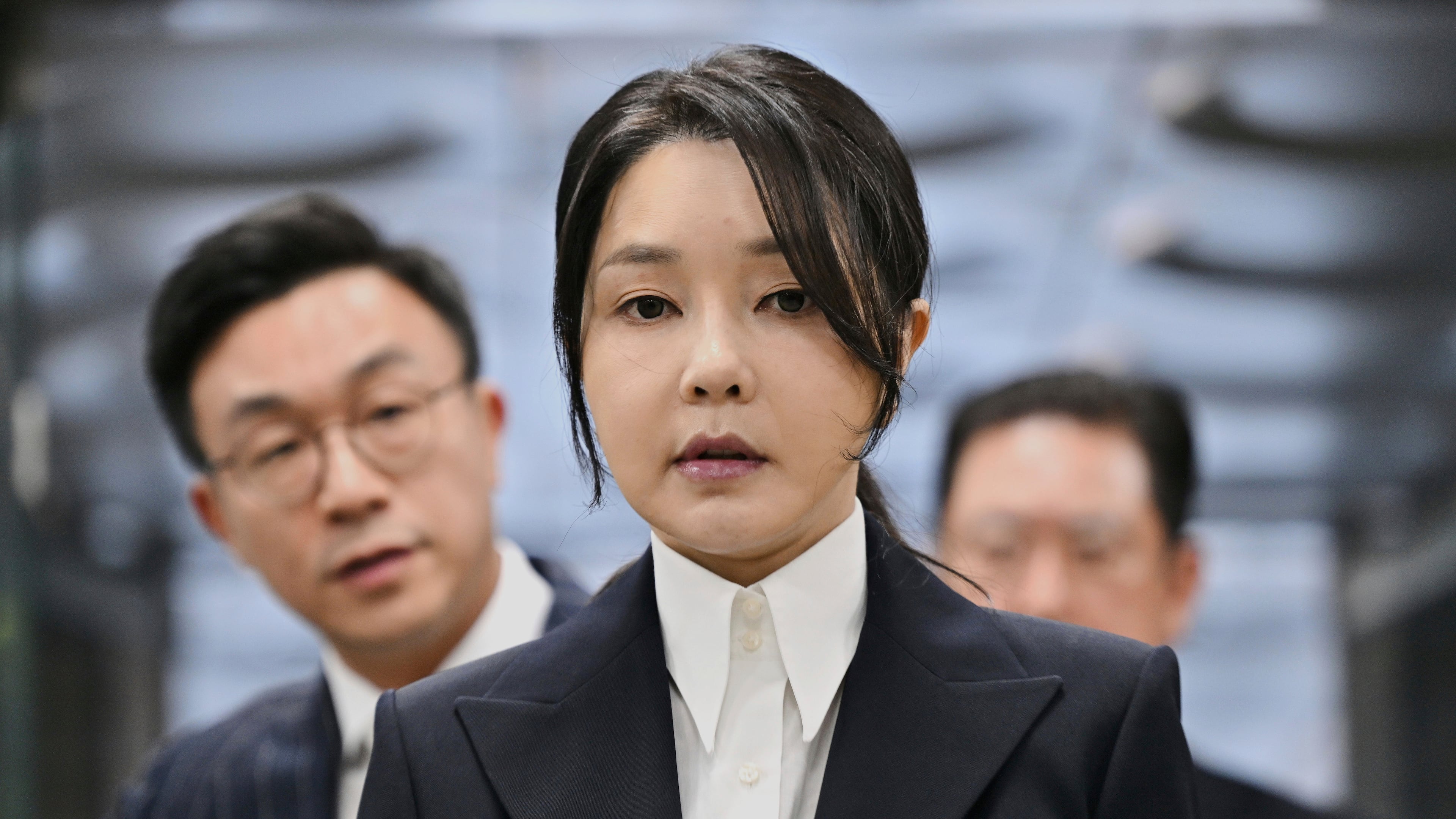 FILE - South Korea's former first lady Kim Keon Hee, wife of former president Yoon Suk Yeol, arrives at a court to attend a hearing to review her arrest warrant requested by special prosecutors, in Seoul, South Korea, on Aug. 12, 2025. (Jung Yeon-je/Pool Photo via AP, File)