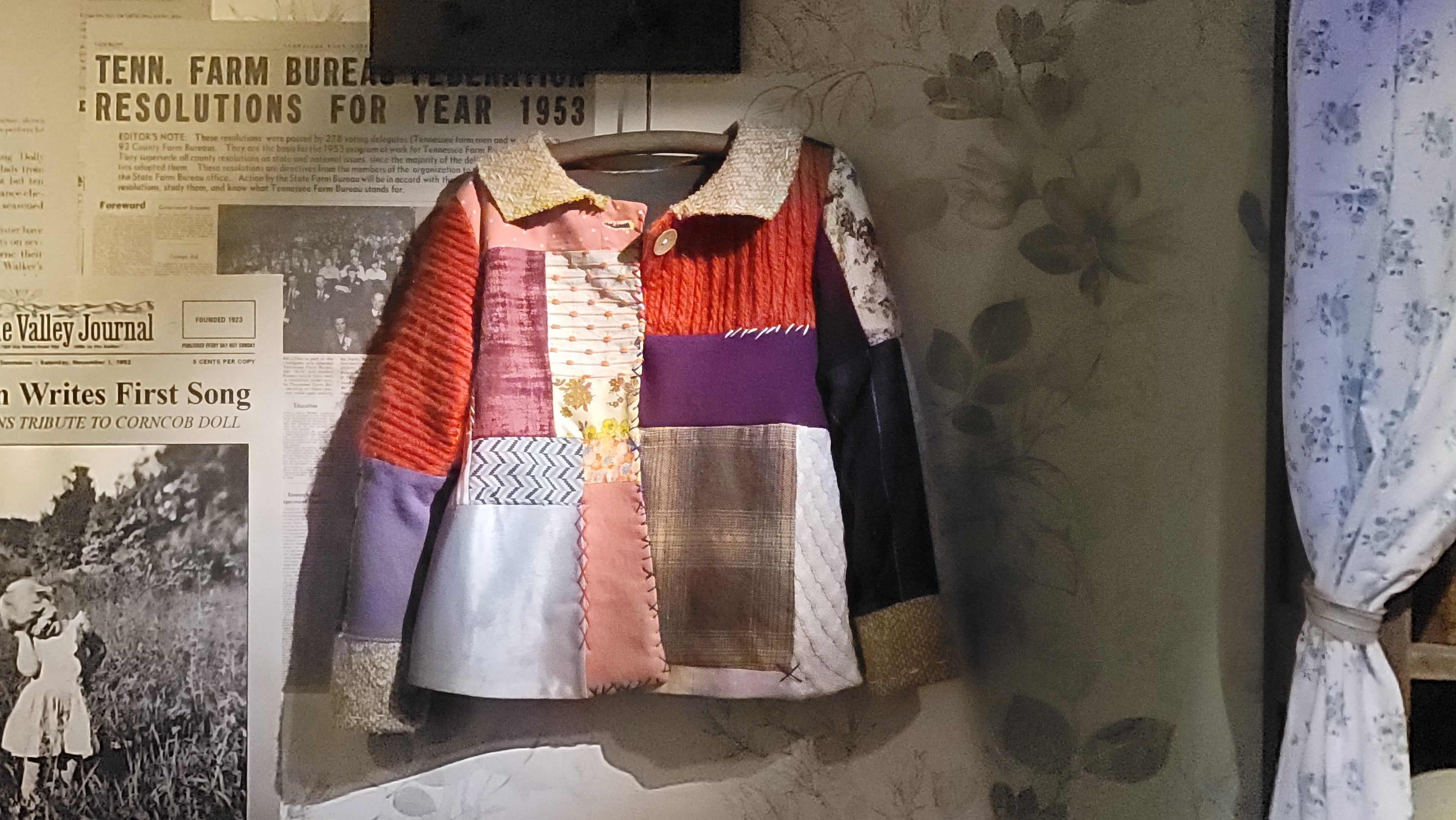Dolly Parton’s childhood coat, which inspired her beloved song “Coat of Many Colors,” is among the personal artifacts celebrating her life and legacy at the new museum. (Tracey Teo for the AJC)