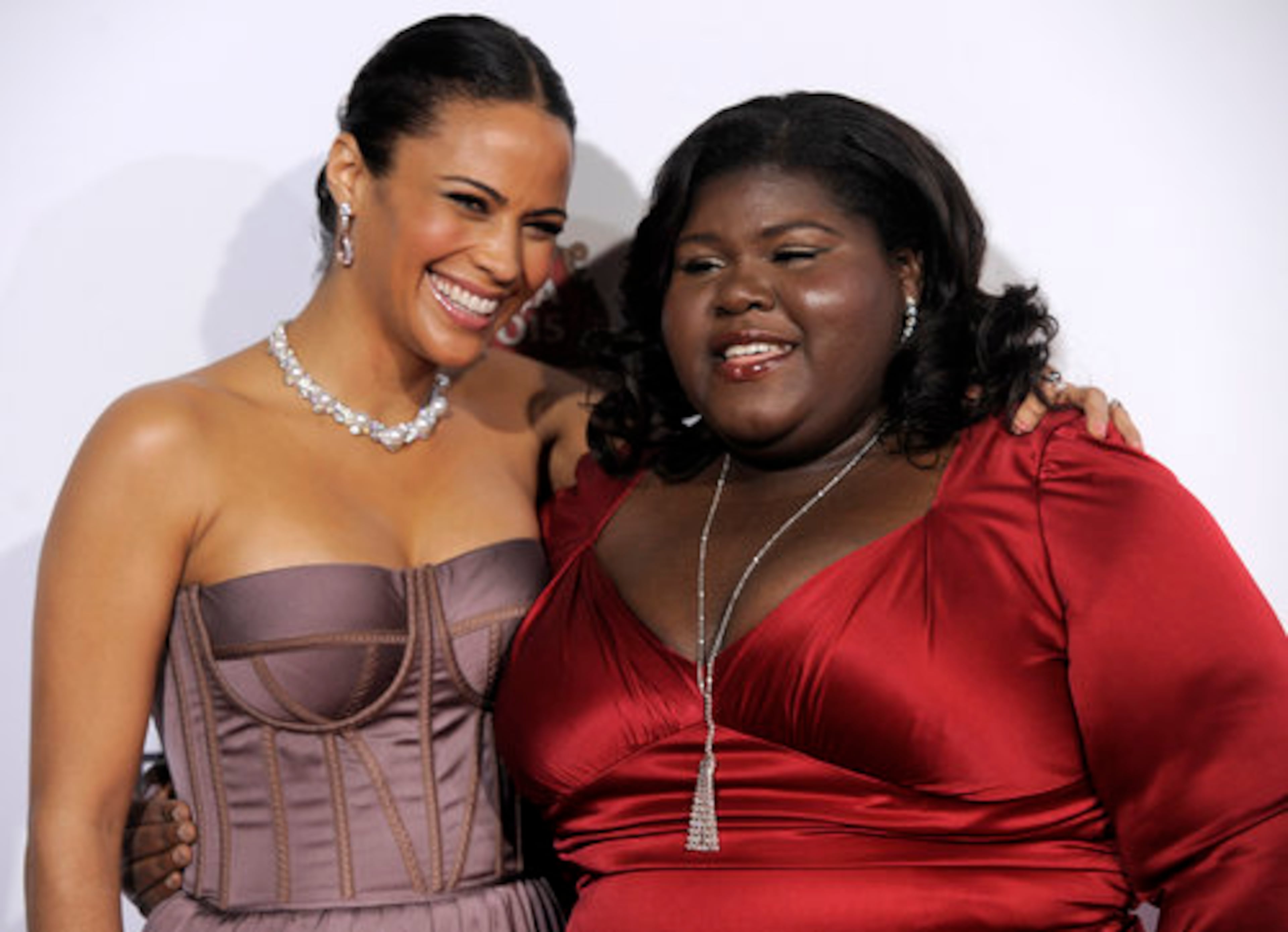 Paula Patton, left, and Gabourey Sidibe, cast members in "Precious: Based on the Novel 'Push' by Sapphire, " pose together at the premiere of the film at AFI Fest 2009 in Los Angeles.