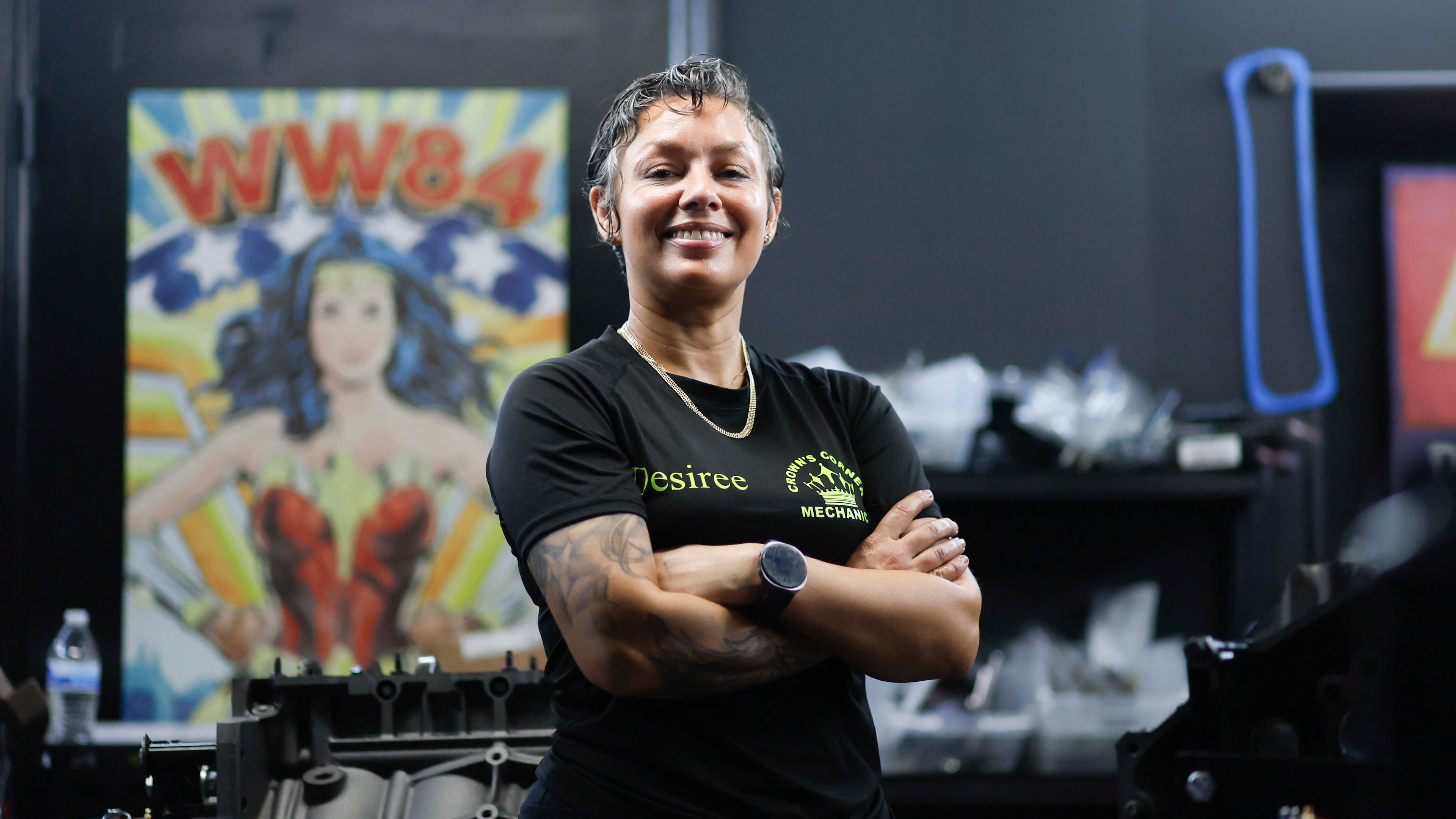 Desiree White, owner of Crown’s Corner Mechanics, stands in the engine room where she has five machines working simultaneously on Thursday, June 4, 2026. The shop offers general mechanic services, but specializes in building vintage car engines. (Miguel Martinez/AJC)