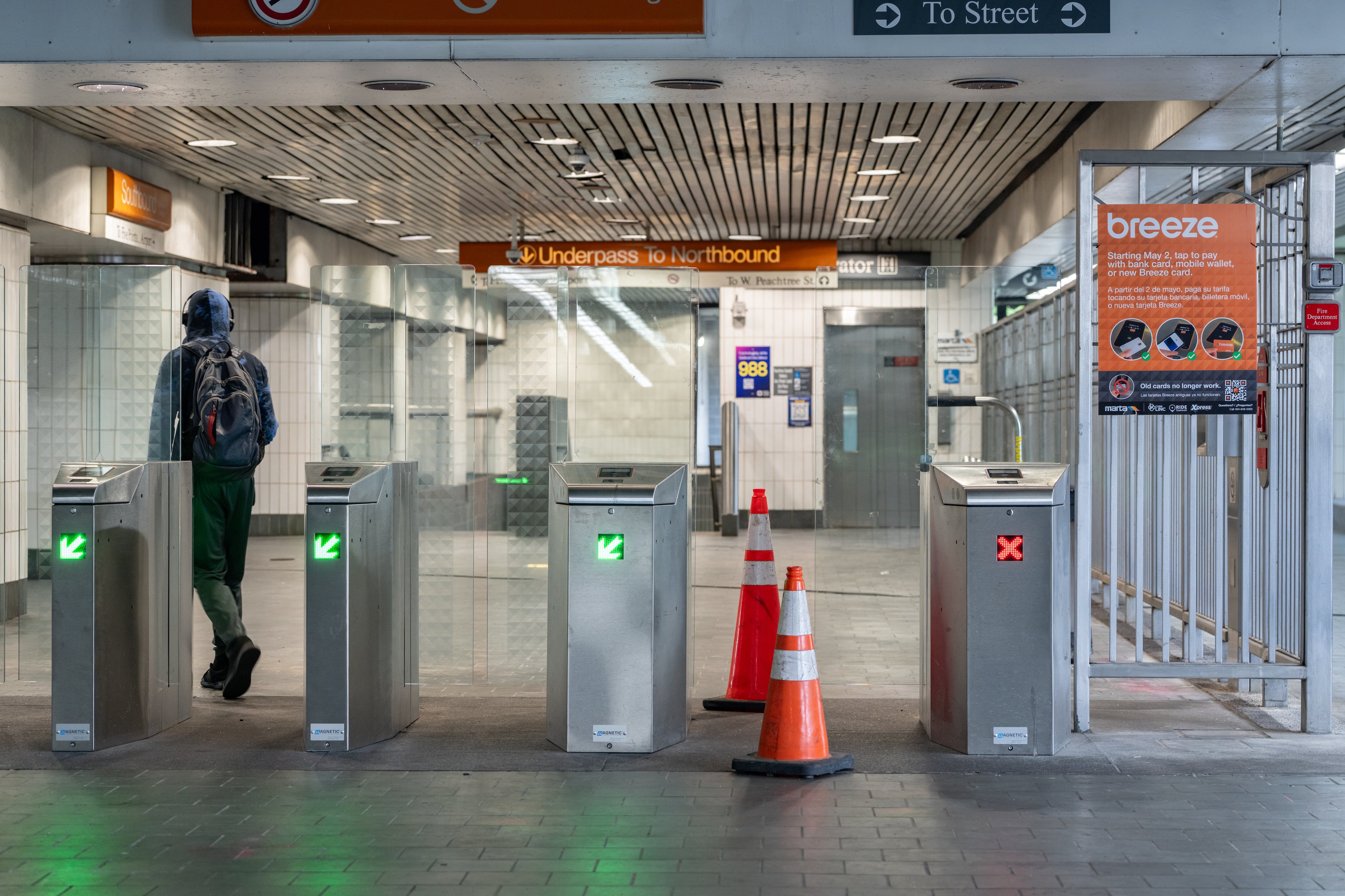 Orange cones block entry to a broken faregate at the Civic Center MARTA station on Tuesday, June 2, 2026. (Ben Hendren for the AJC)