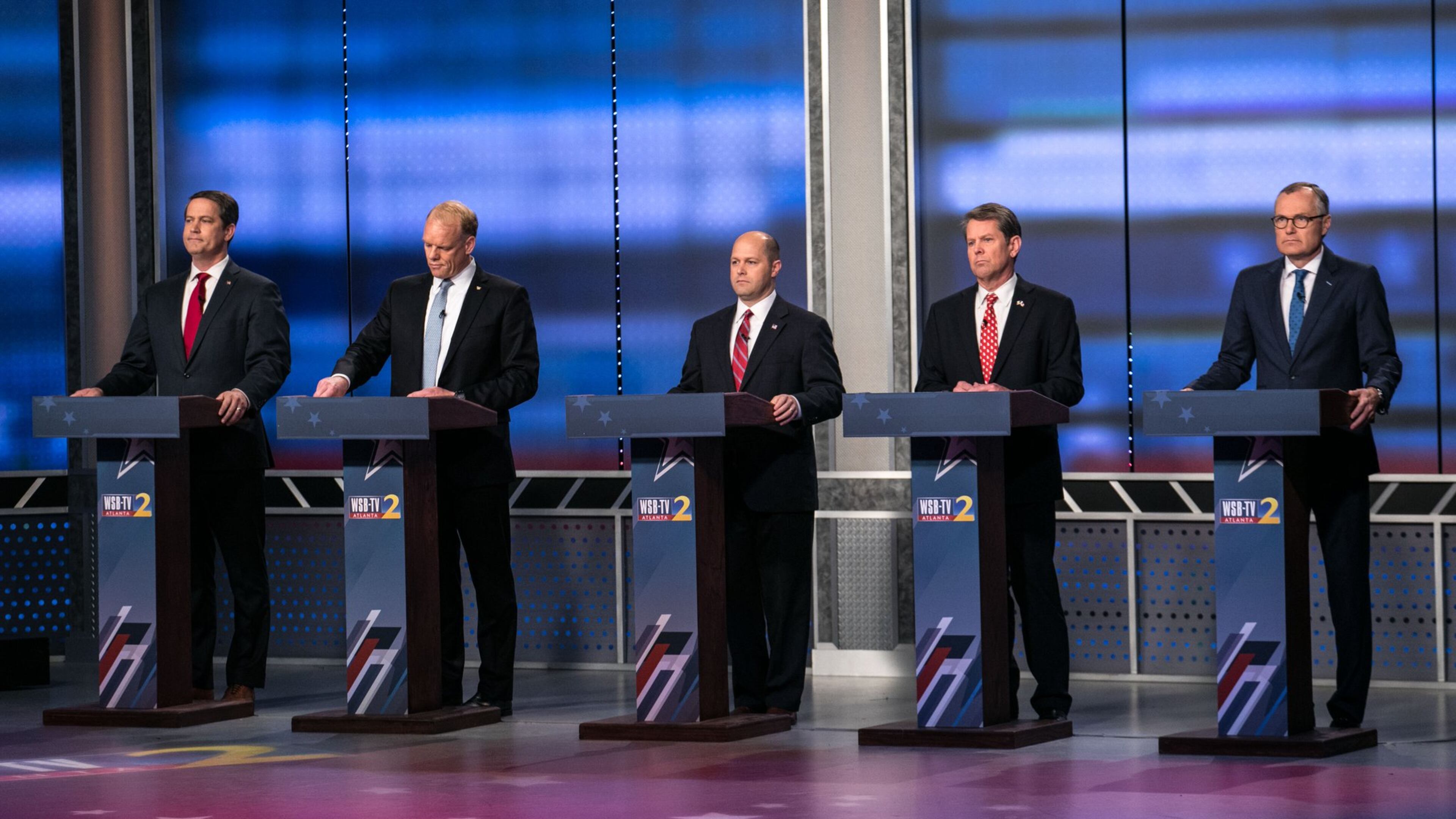 Republican candidates for governor Michael Williams, from left, Clay Tippins, Hunter Hill, Brian Kemp, and Casey Cagle wait for the start of the Atlanta Journal-Constitution, Channel 2 Action News and WSB Radio debate, Sunday, May 20, 2018, in Atlanta. BRANDEN CAMP/SPECIAL