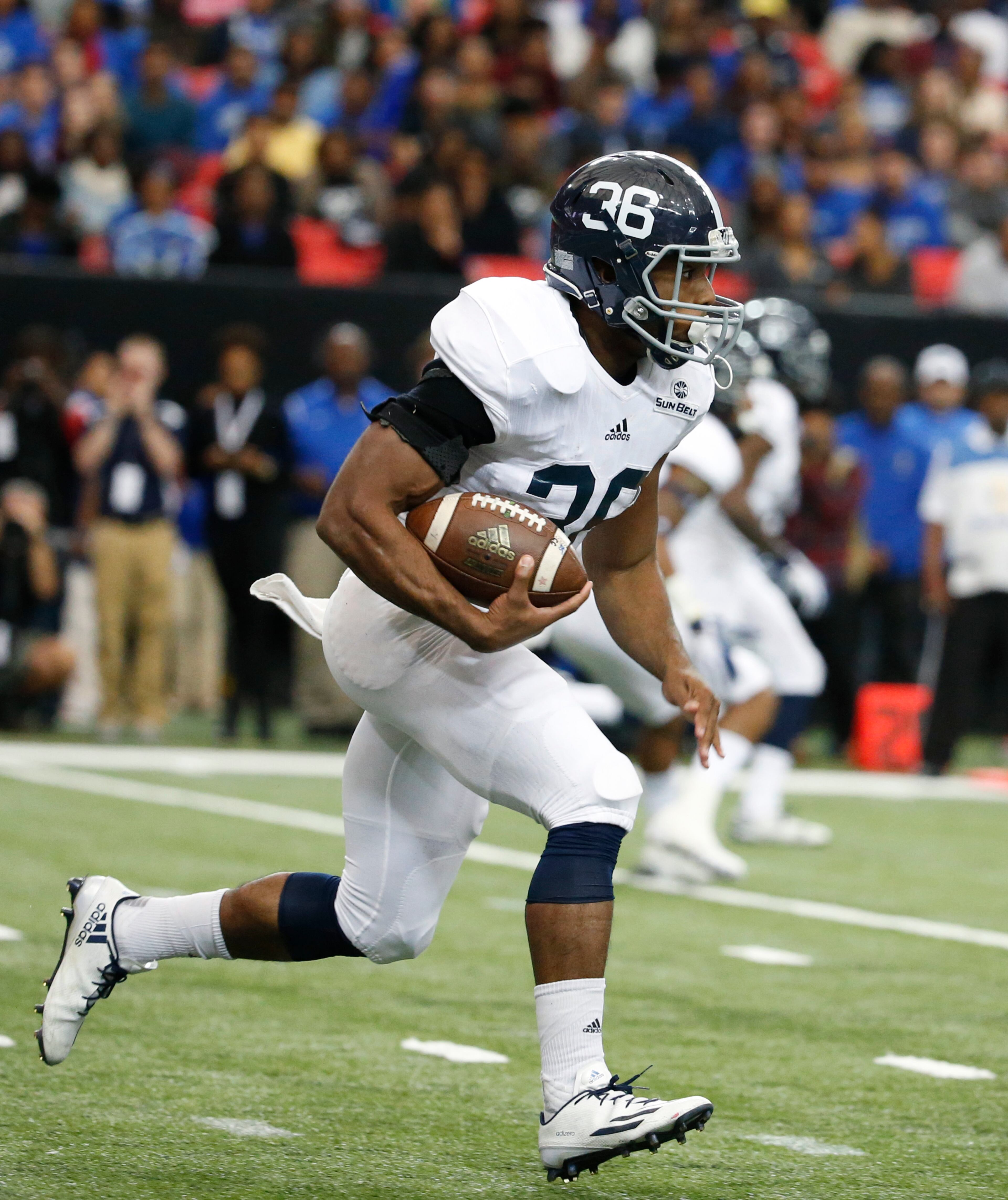 November 19, 2016 - Atlanta, Ga: Georgia Southern Eagles wide receiver Jaylen Searcy (38) carries the ball against the Georgia State Panthers during the first half at the Georgia Dome Saturday November 19, 2016, in Atlanta, Ga. PHOTO / JASON GETZ
