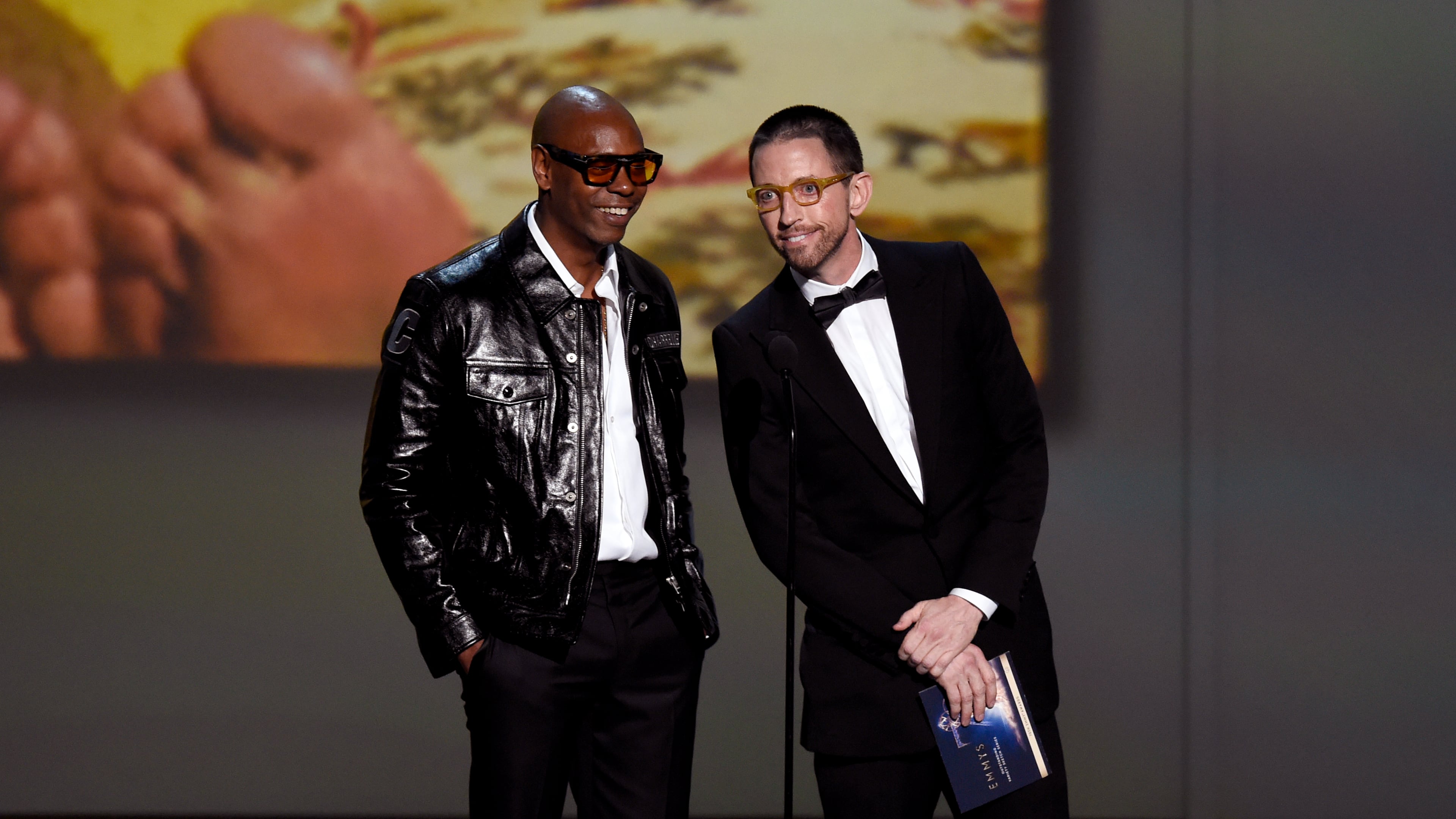Dave Chappelle, left, and Neal Brennan present the award for outstanding variety sketch series at the 70th Primetime Emmy Awards on Monday, Sept. 17, 2018, at the Microsoft Theater in Los Angeles. (Photo by Chris Pizzello/Invision/AP)