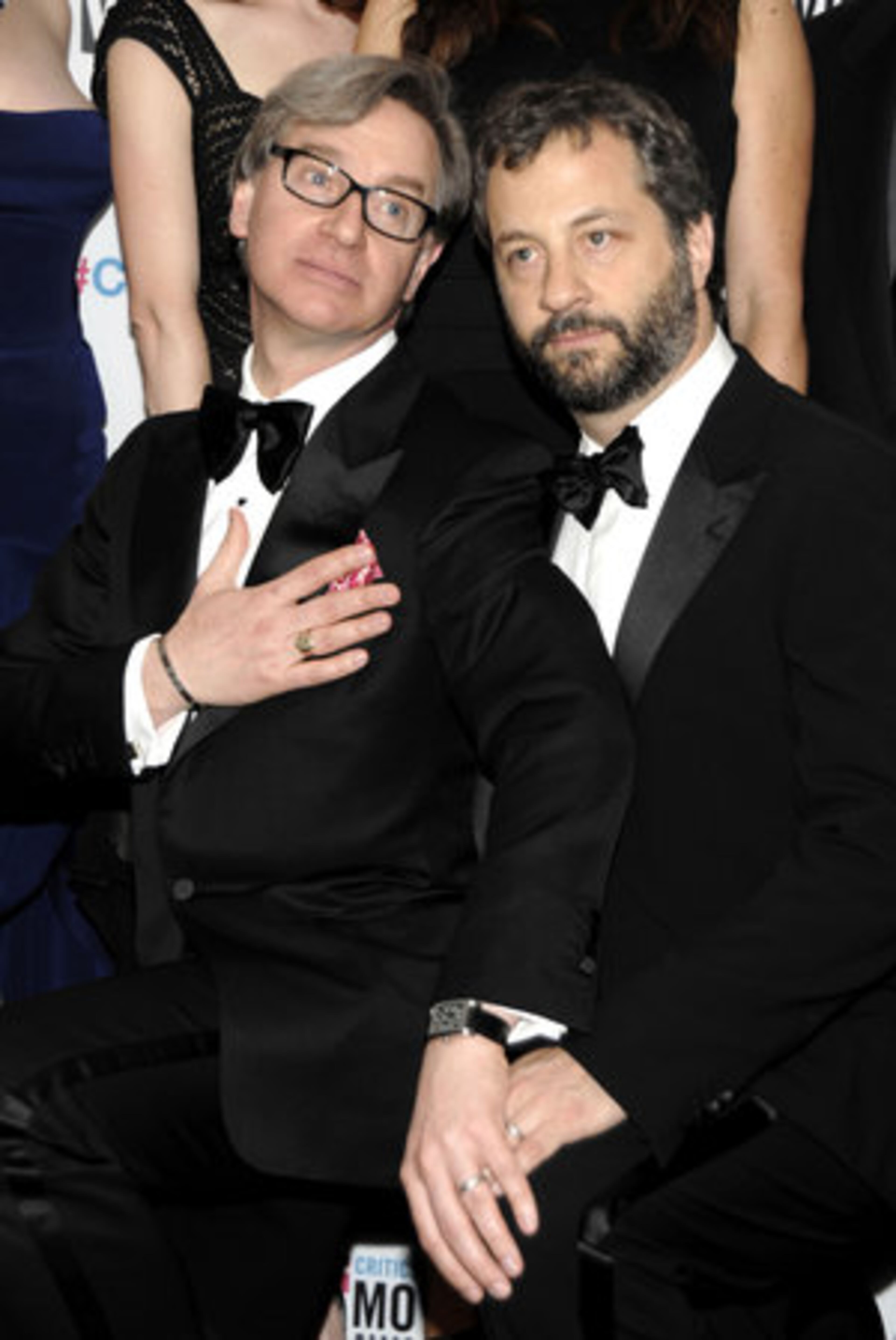 Executive producer/director Paul Feig, left, and producer Judd Apatow pose backstage with the award for best comedy movie award for "Bridesmaids."