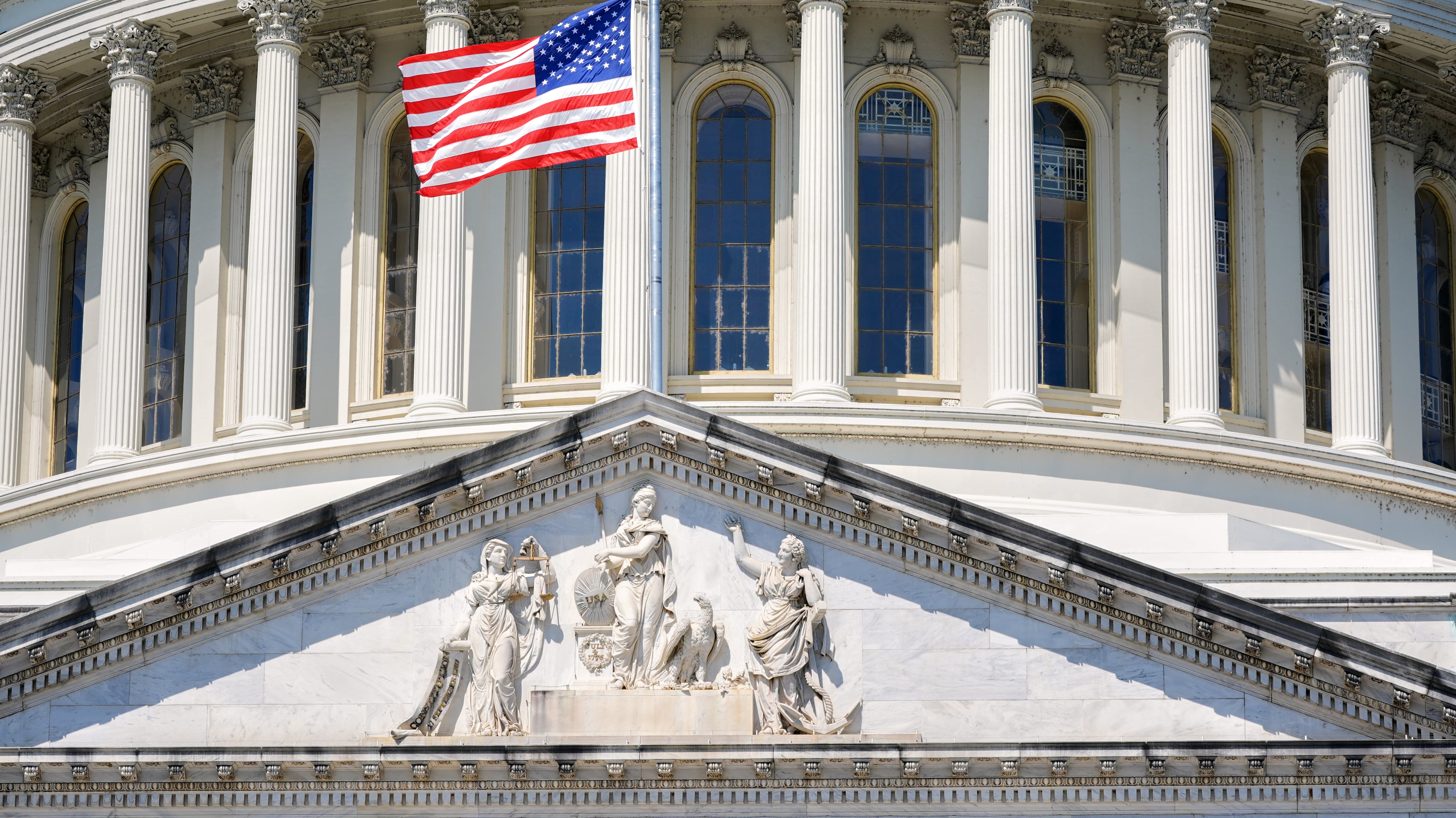 The U.S. flag flies at half-staff at the Capitol in Washington, Monday, July 13, 2026, after the sudden death of prominent Republican Senator Lindsey Graham of South Carolina. (AP Photo/Mariam Zuhaib)