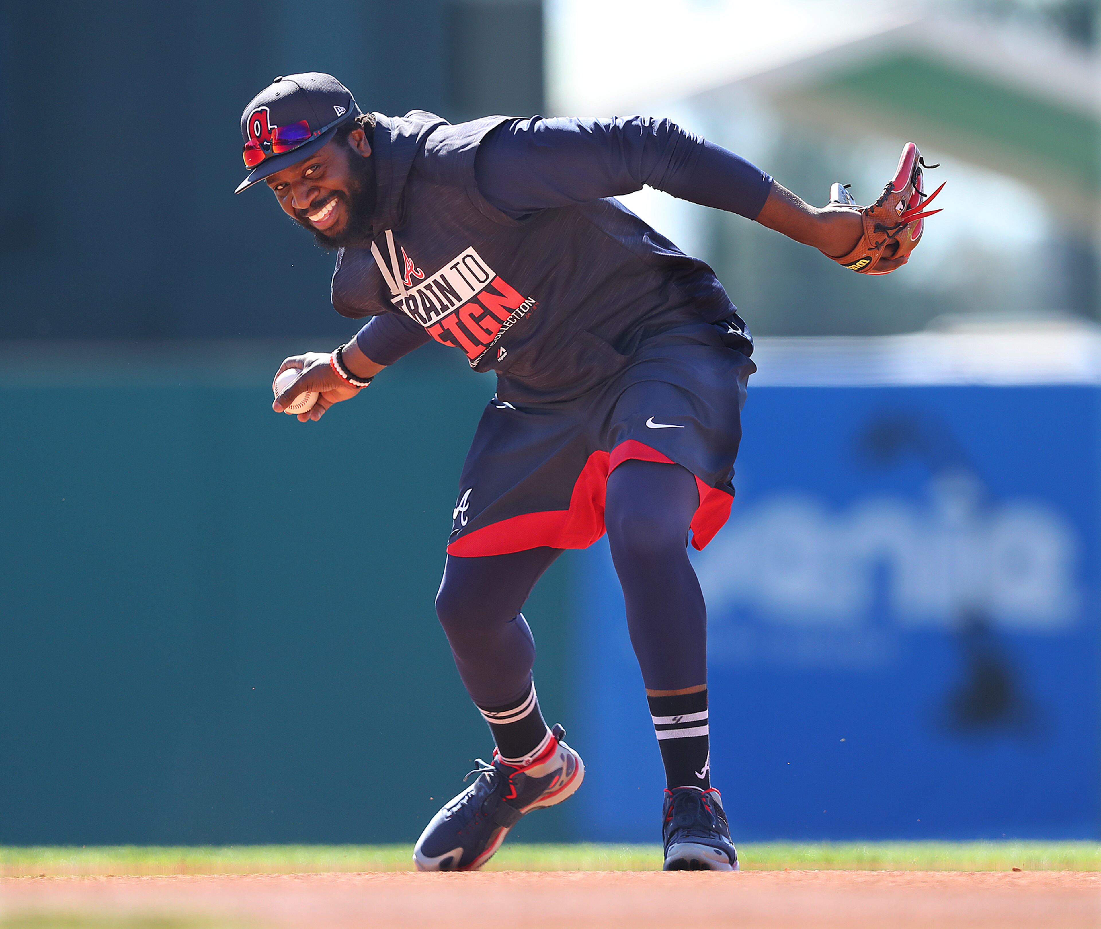 February 17, 2017, Lake Buena Vista, FL: Braves infielder Brandon Phillips fields a grounder on his first day at spring training in Champion Stadium on Friday Feb. 17, 2017, at the ESPN Wide World of Sports in Lake Buena Vista. Curtis Compton/ccompton@ajc.com