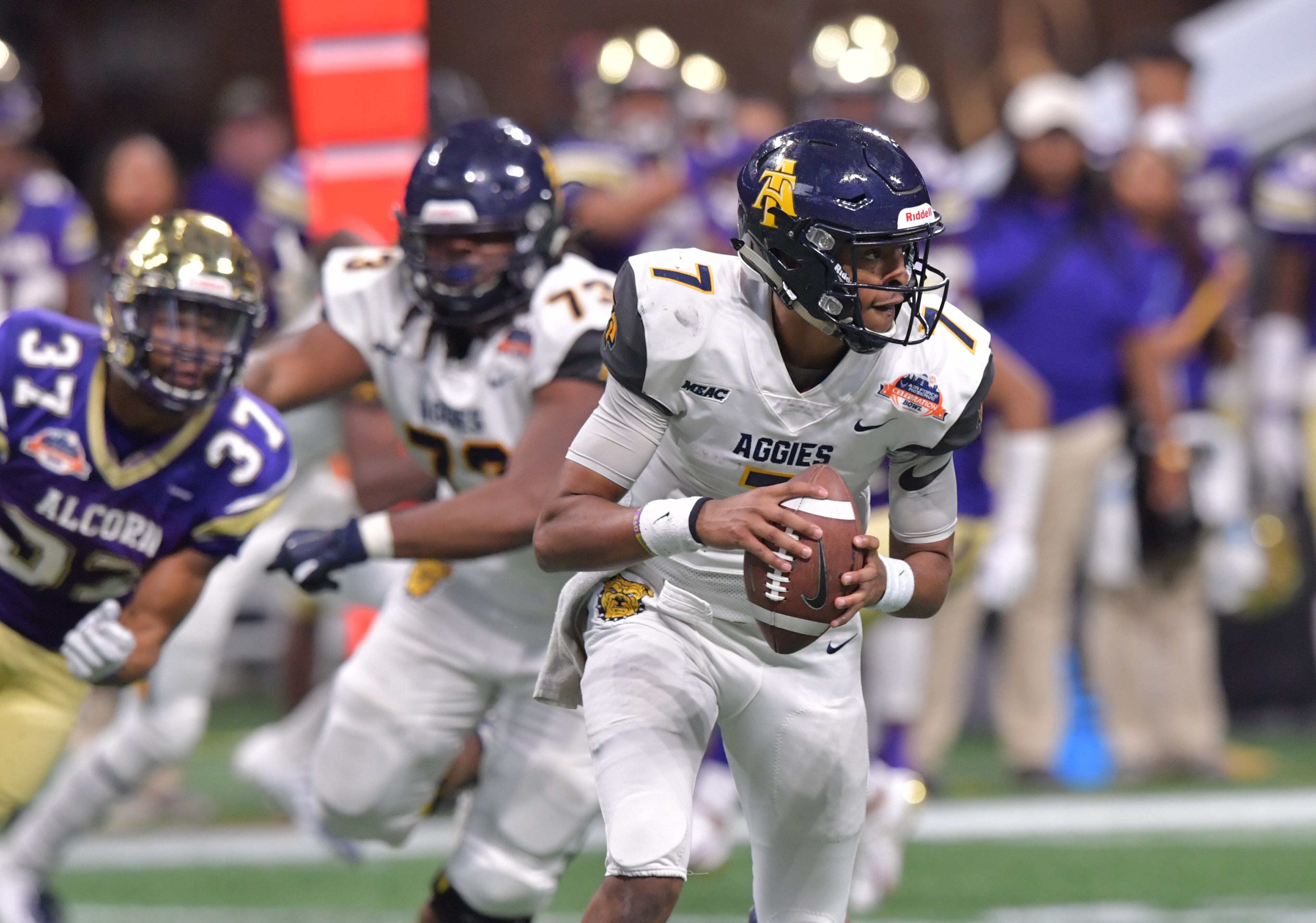 December 15, 2018 Atlanta - North Carolina A&T quarterback Lamar Raynard (7) prepares to pass as Alcorn State linebacker Terry Whittington (37) pursues during the second half of the 2018 Celebration Bowl at Mercedes-Benz Stadium on Saturday, December 15, 2018. North Carolina A&T won 24-22 over the Alcorn State. HYOSUB SHIN / HSHIN@AJC.COM