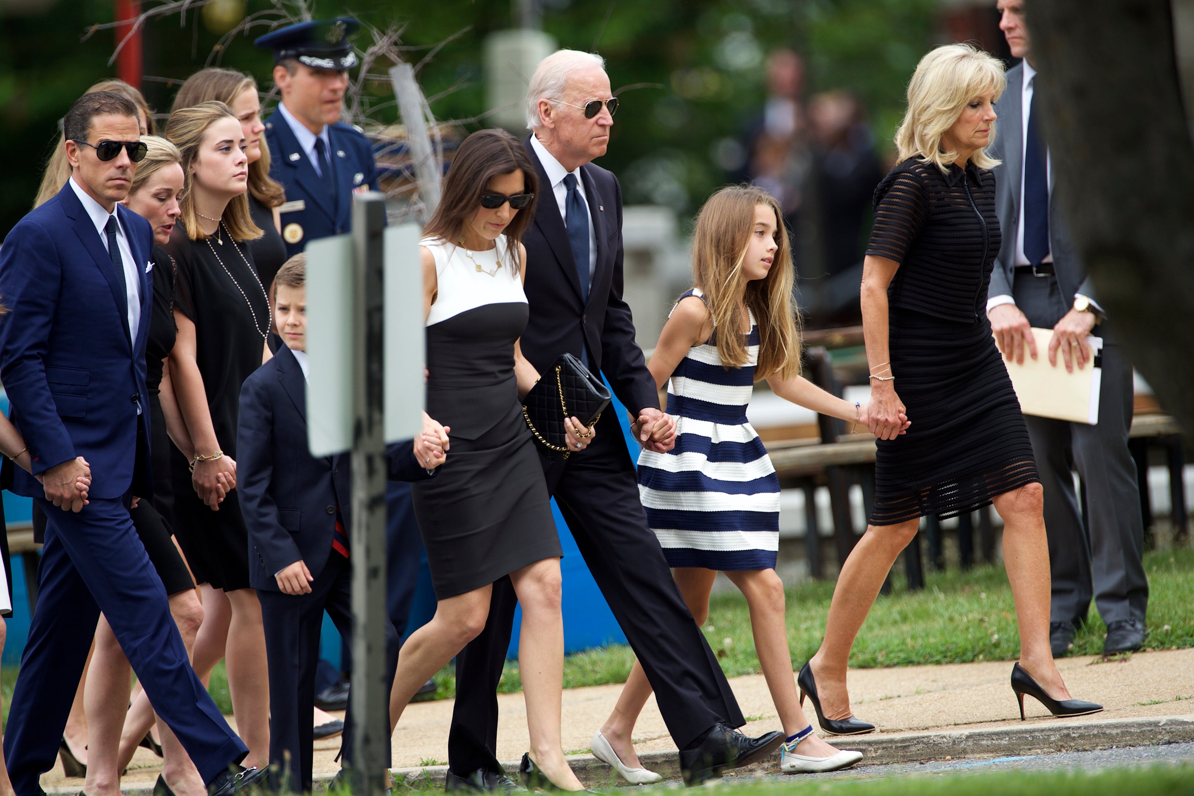 WILMINGTON, DE - JUNE 6: U.S. Vice President Joe Biden (C) and his wife Dr. Jill Biden (R) arrive with family for a mass of Christian burial at St. Anthony of Padua Church for there son, former Delaware Attorney General Beau Biden, on June 6, 2015 in Wilmington, Delaware. U.S. President Barack Obama is expected to deliver a eulogy for the son of Vice President Joe Biden after he died at 46 following a two-year battle with brain cancer. (Photo by Mark Makela/Getty Images)