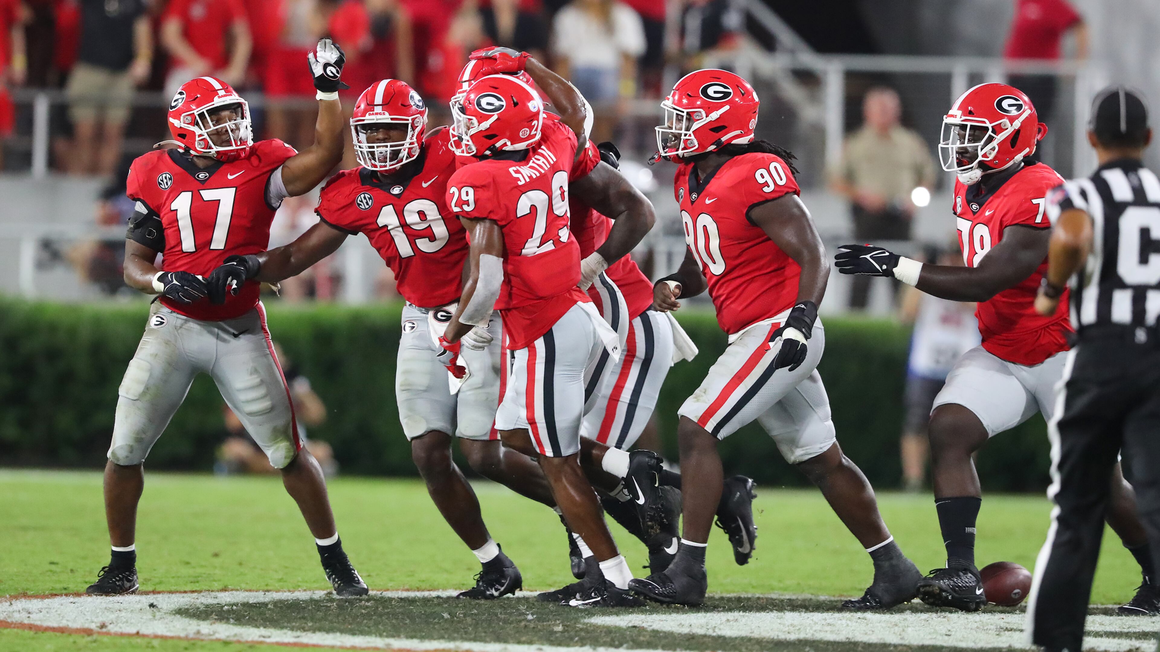 Georgia players celebrate recovering a fumble by South Carolina on Saturday, Sept 18, 2021, in Athens. Curtis Compton / Curtis.Compton@ajc.com