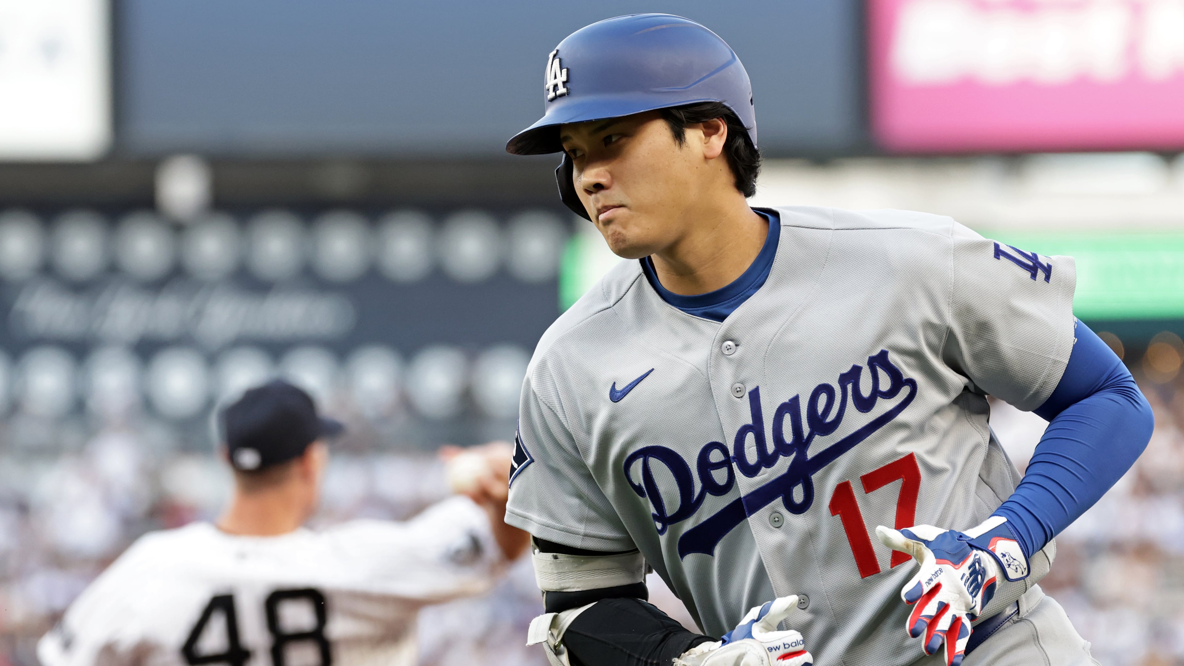 Los Angeles Dodgers designated hitter Shohei Ohtani (17) reacts after grounding out during the first inning of a baseball game against the New York Yankees, Friday, July 17, 2026, in New York. (AP Photo/Adam Hunger)