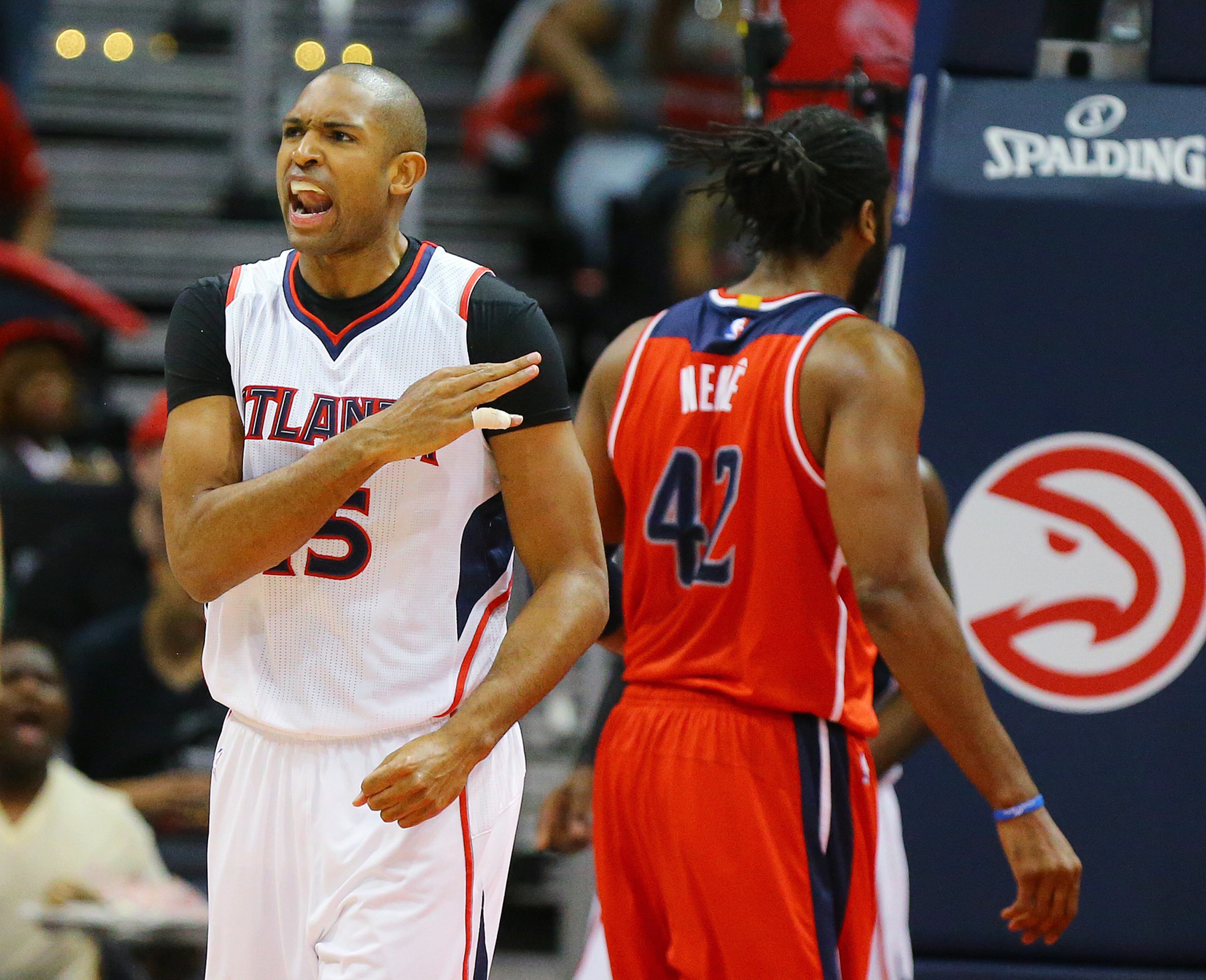 Hawks Al Horford reacts to blocking a shot by Wizards Nene in their Eastern Conference Semifinals game 5 on Tuesday, May 13, 2015, in Atlanta. Curtis Compton / ccompton@ajc.com