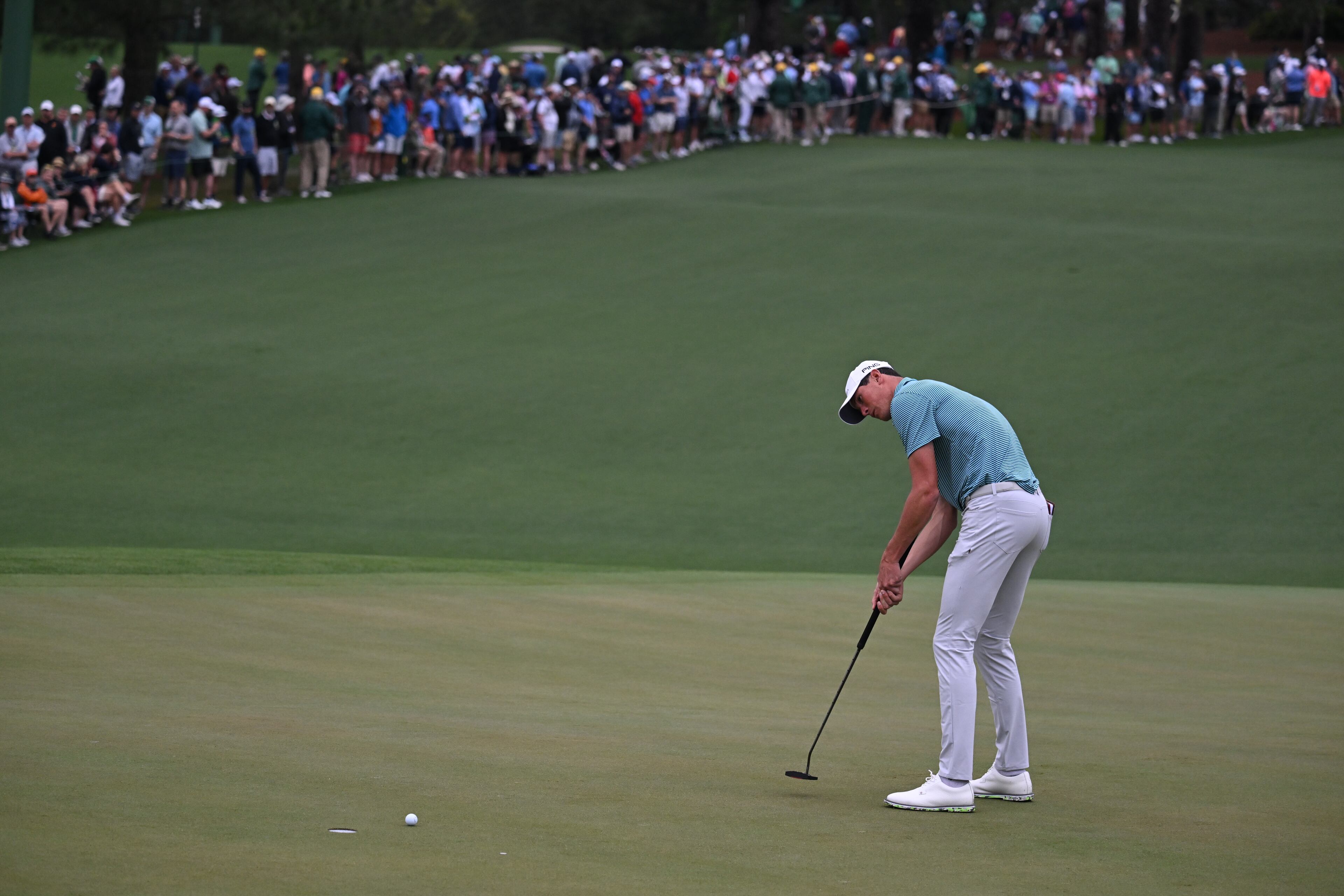 Christo Lamprecht putts on the second hole at the 2024 Masters Tournament at Augusta National Golf Club, Thursday, April 11, 2024, in Augusta, Ga. (Hyosub Shin / Hyosub.Shin@ajc.com)