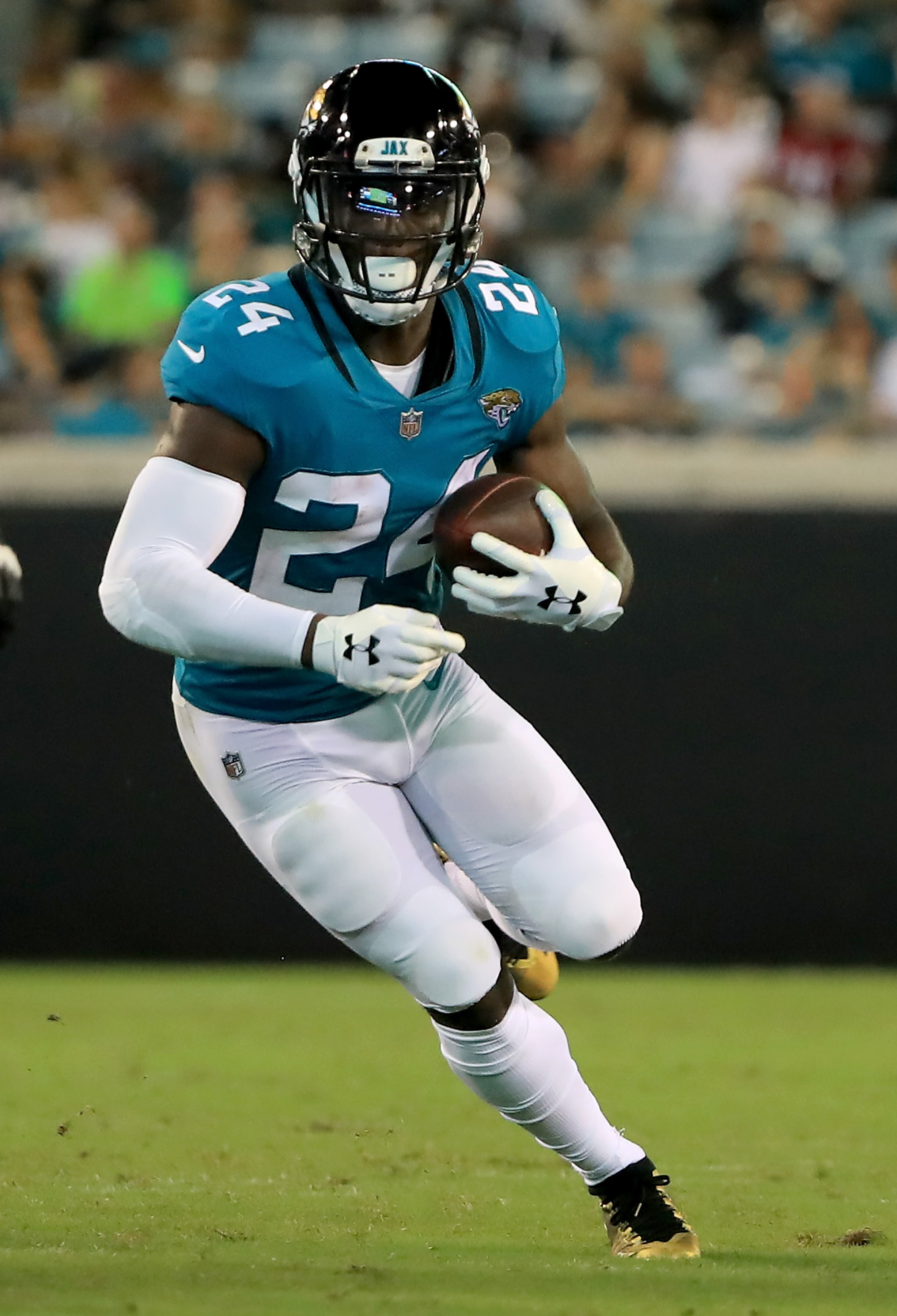 JACKSONVILLE, FL - AUGUST 25: T.J. Yeldon #24 of the Jacksonville Jaguars runs for yardage during a preseason game against the Atlanta Falcons at TIAA Bank Field on August 25, 2018 in Jacksonville, Florida. (Photo by Sam Greenwood/Getty Images)