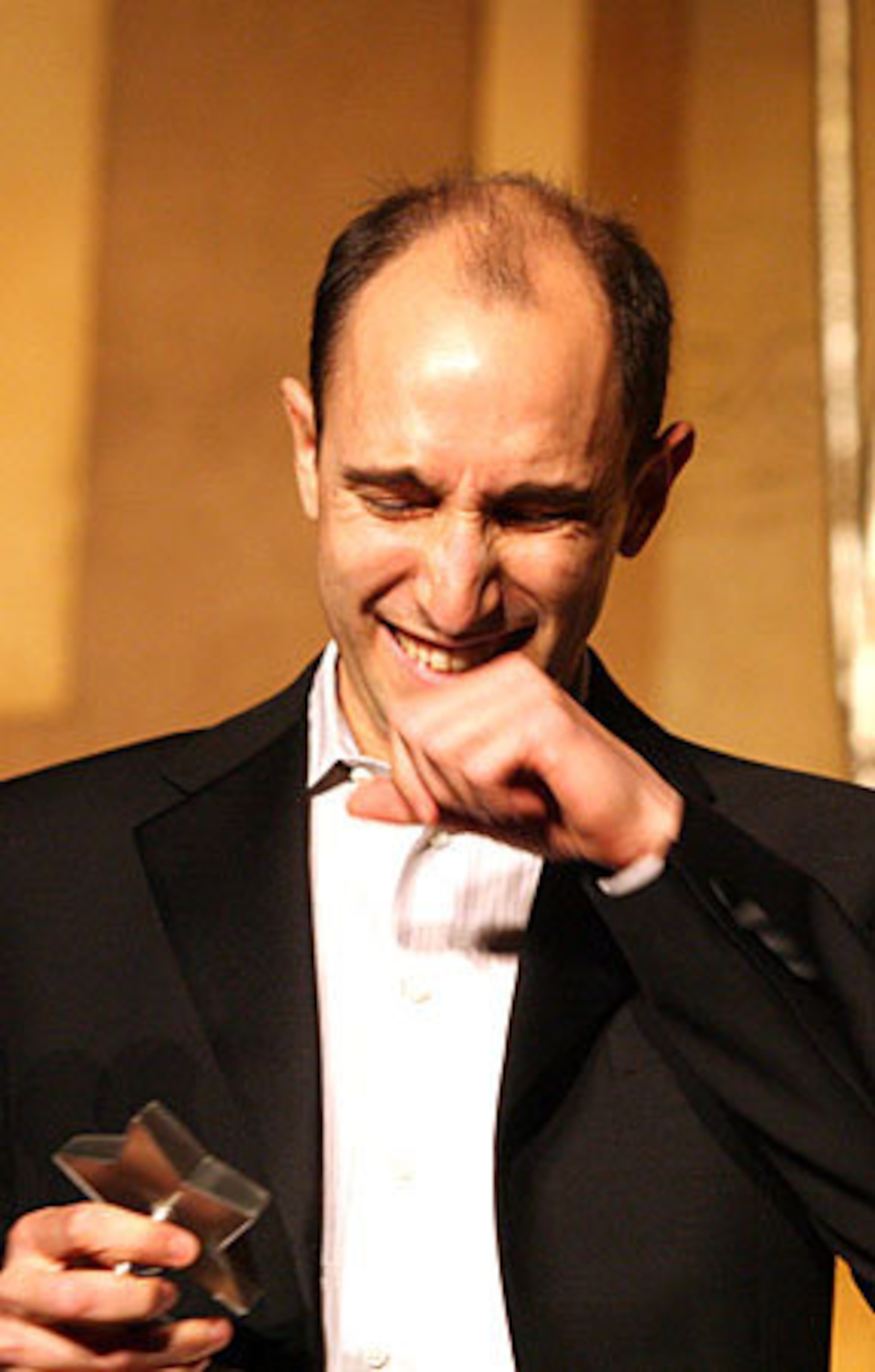 Andrew Benator accepts the award for best featured actor in a play for his role in 'Eurydice'.