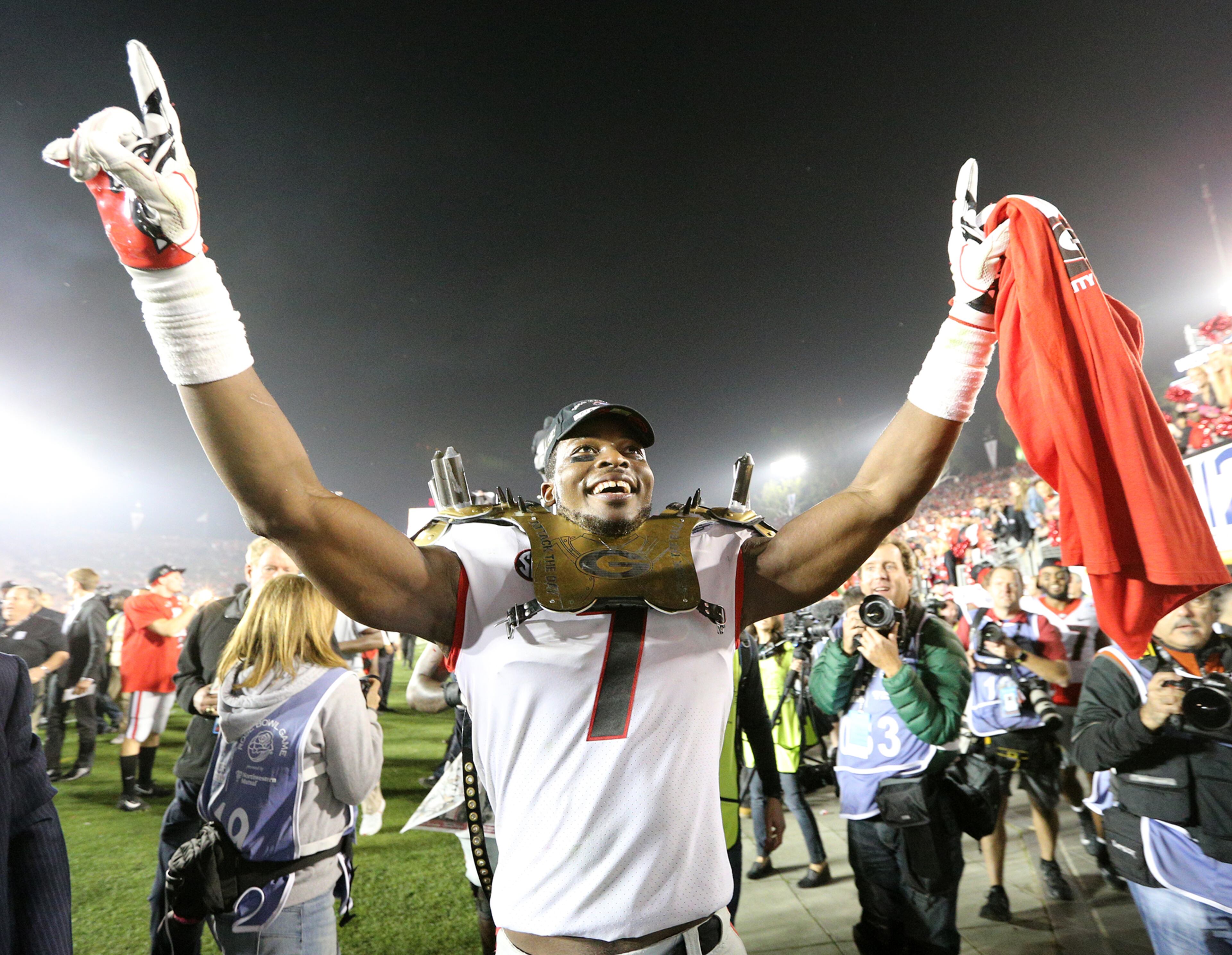 January 1, 2018 Pasadena: Georgia linebacker Lorenzo Carter celebrates beating Oklahoma 54-48 during double over time in the College Football Playoff Semifinal at the Rose Bowl Game on Monday, January 1, 2018, in Pasadena. Curtis Compton/ccompton@ajc.com