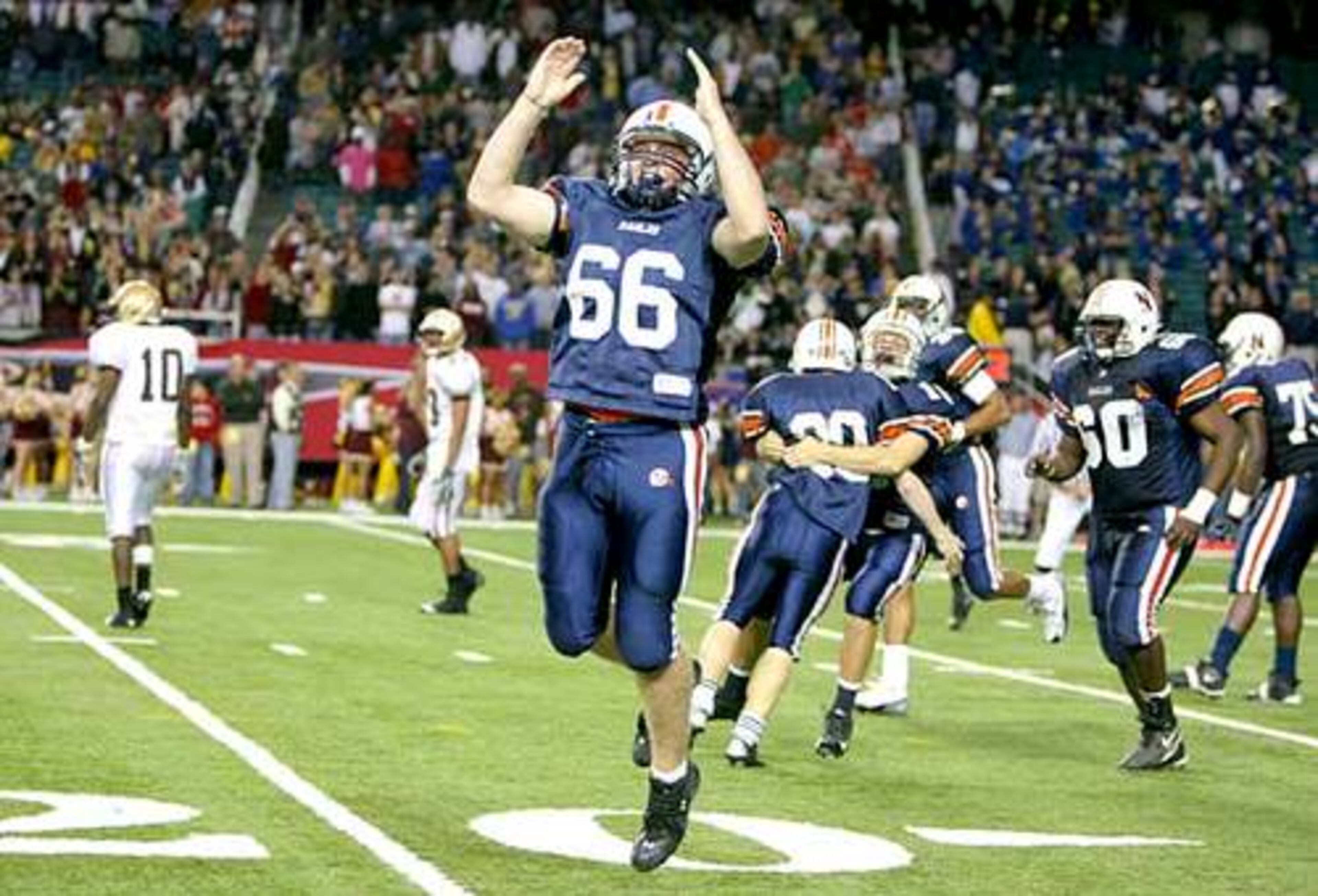 Northside-Warner Robins lineman Don Werden celebrates after teammate Devon Pike kicked the game-winning field goal that sent the Eagles to the Class AAAA finals.