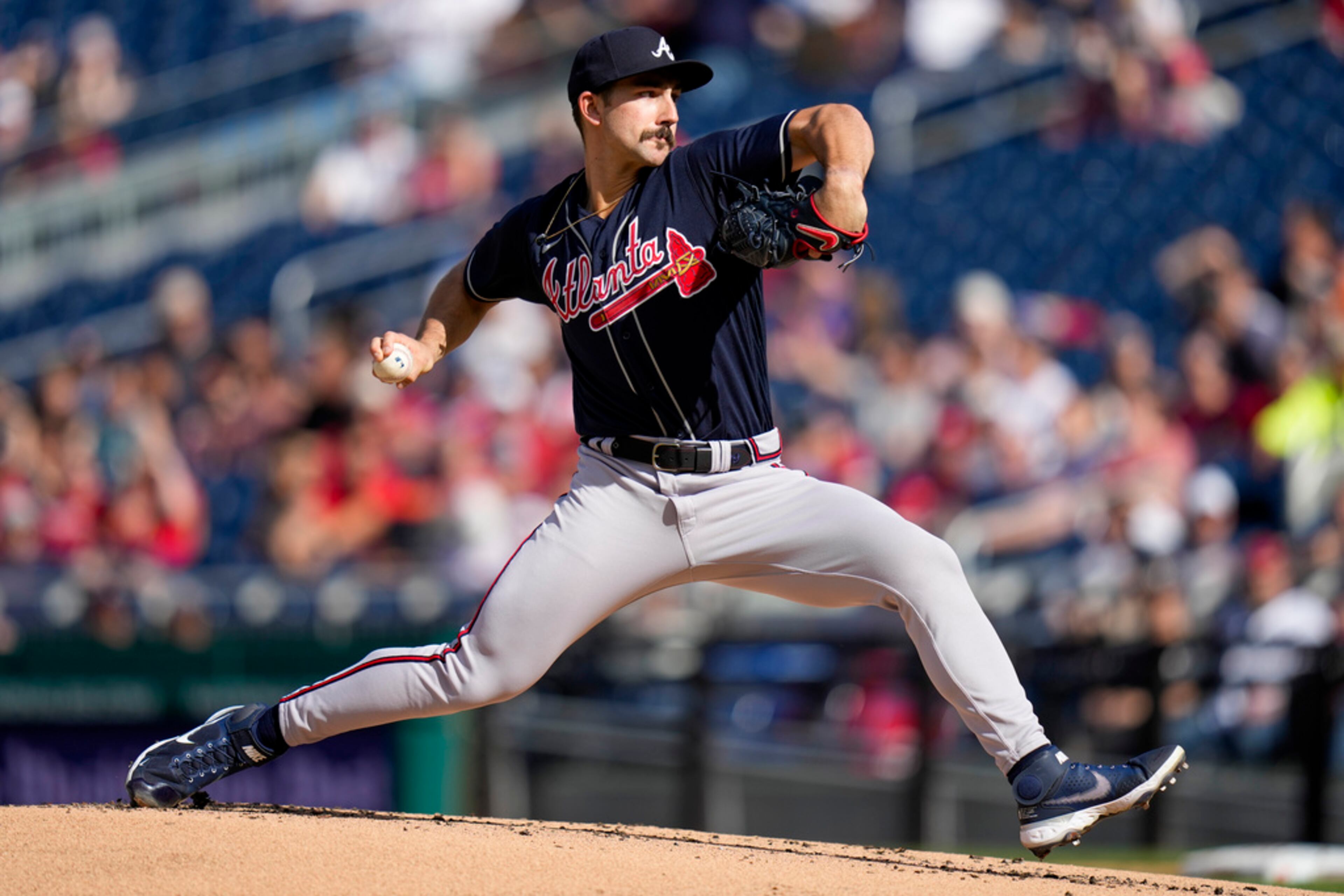 Atlanta Braves starting pitcher Spencer Strider throws during the first inning of a baseball game against the Washington Nationals at Nationals Park, Saturday, April 1, 2023, in Washington. (AP Photo/Alex Brandon)