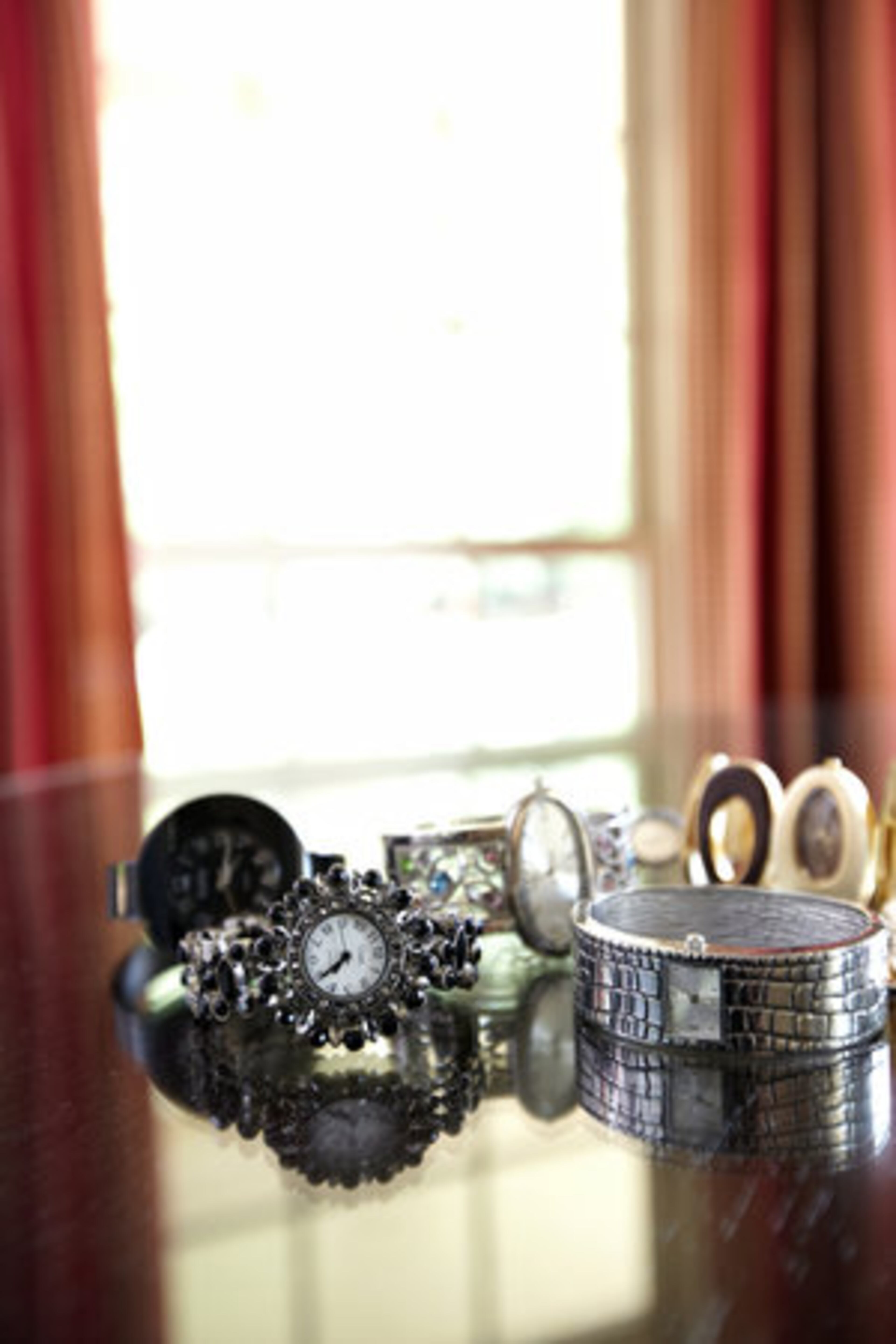 BIGGEST SPLURGE: "A black diamond necklace. I was jewelry shopping in Jaipur, India, when I saw this Victorian-style piece. Though I was hunting for bargain jewelry, I could not resist putting a few G's down for this one." Sucheta Lakhe's large collection of watches include a silver one with black stone detailing and an oversized black trim watch both from Stein Mart. Lakhe purchased her jewel beaded watch from Target.