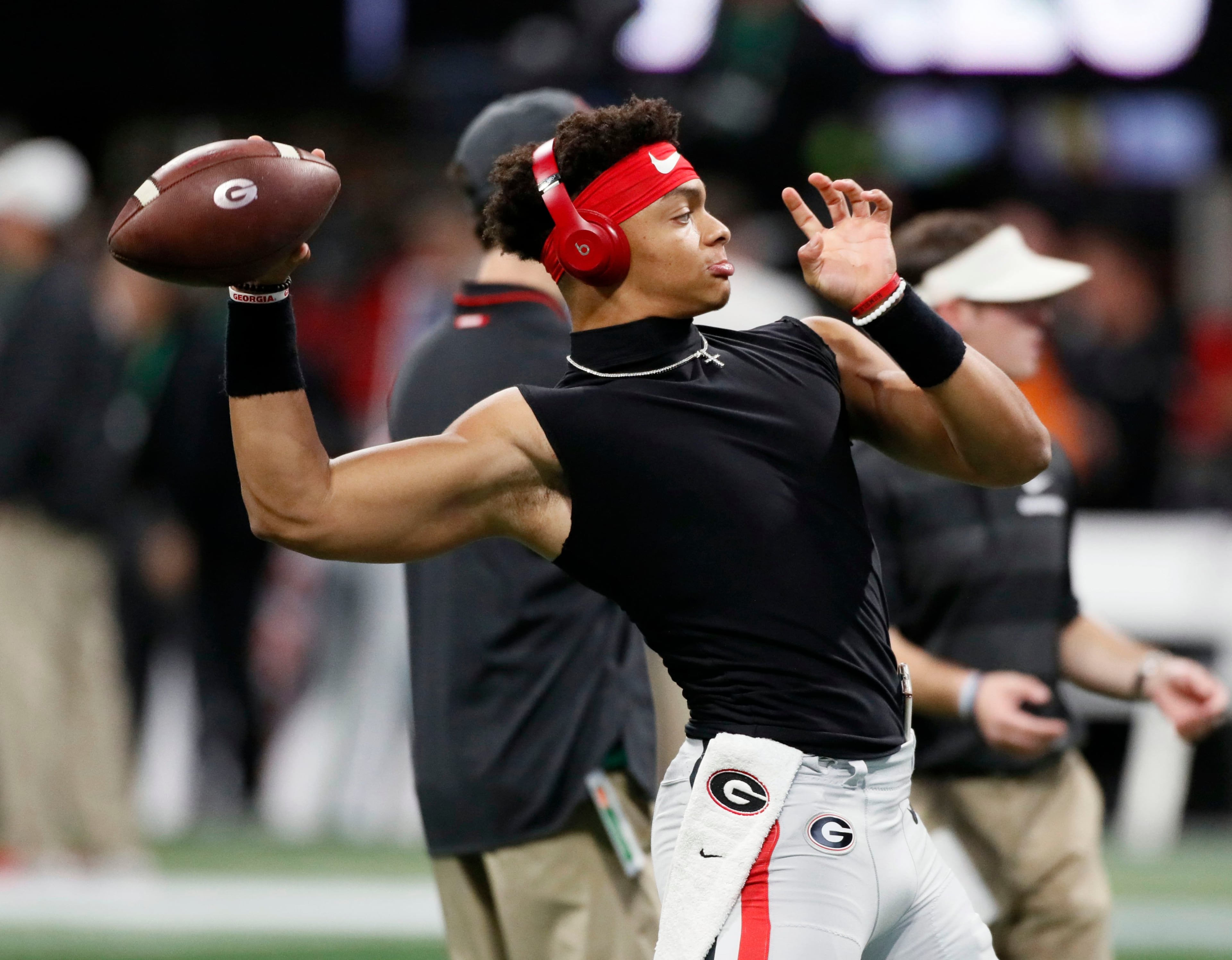 12/1/18 - Atlanta - Georgia Bulldogs quarterback Justin Fields (1) throws during an early pregame warmup. The University of Georgia Bulldogs plays the Alabama Crimson Tide in a NCAA college football game for the Southeastern Conference Championship Saturday, Dec. 1, 2018, at Mercedes-Benz Stadium in Atlanta, GA. BOB ANDRES / BANDRES@AJC.COM