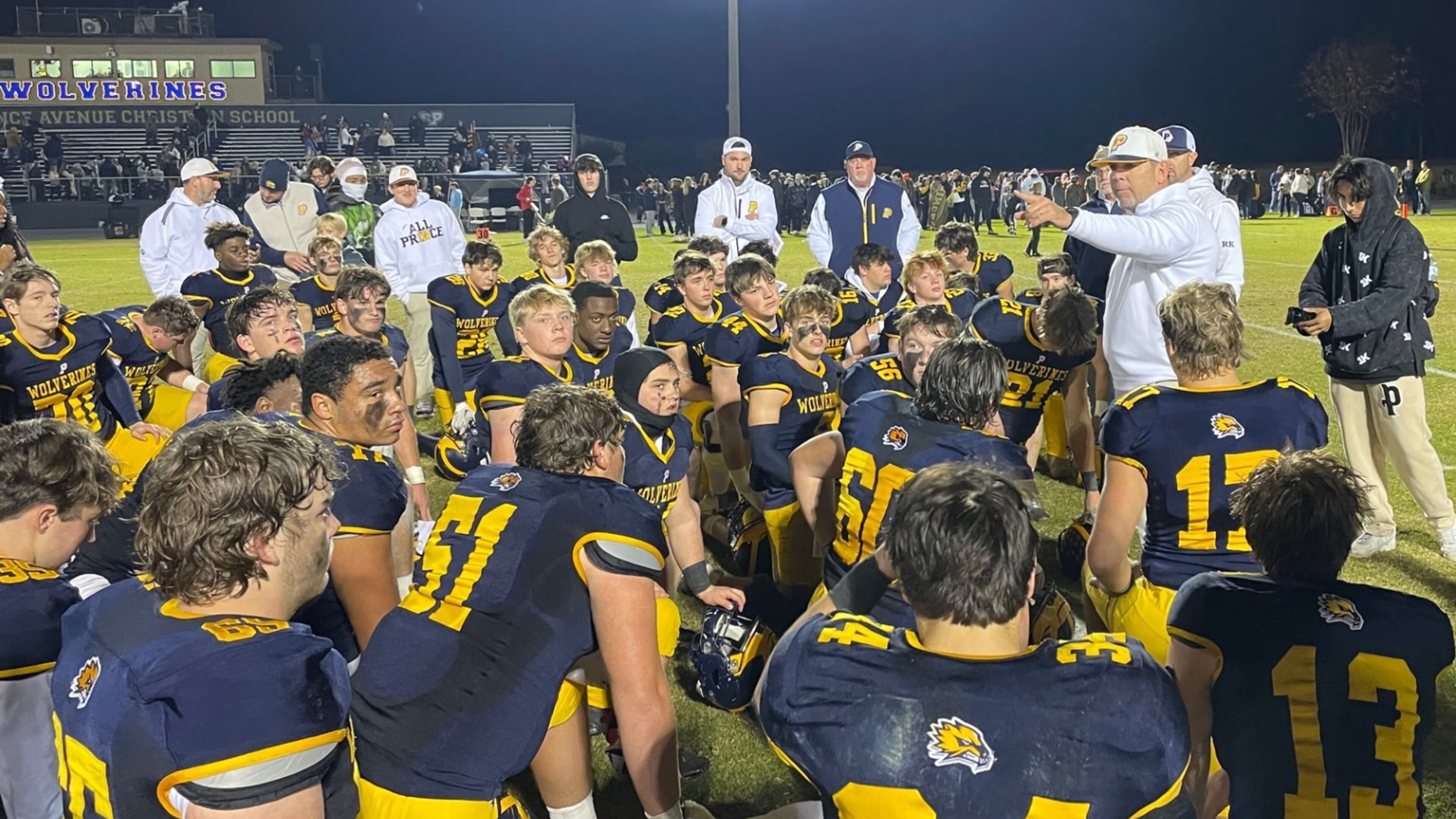 Prince Avenue Christian head coach Greg Vandagriff talks with his players after the team's 41-7 victory over Irwin County in the Class A Division I quarterfinals in Bogart on Nov. 24, 2023
