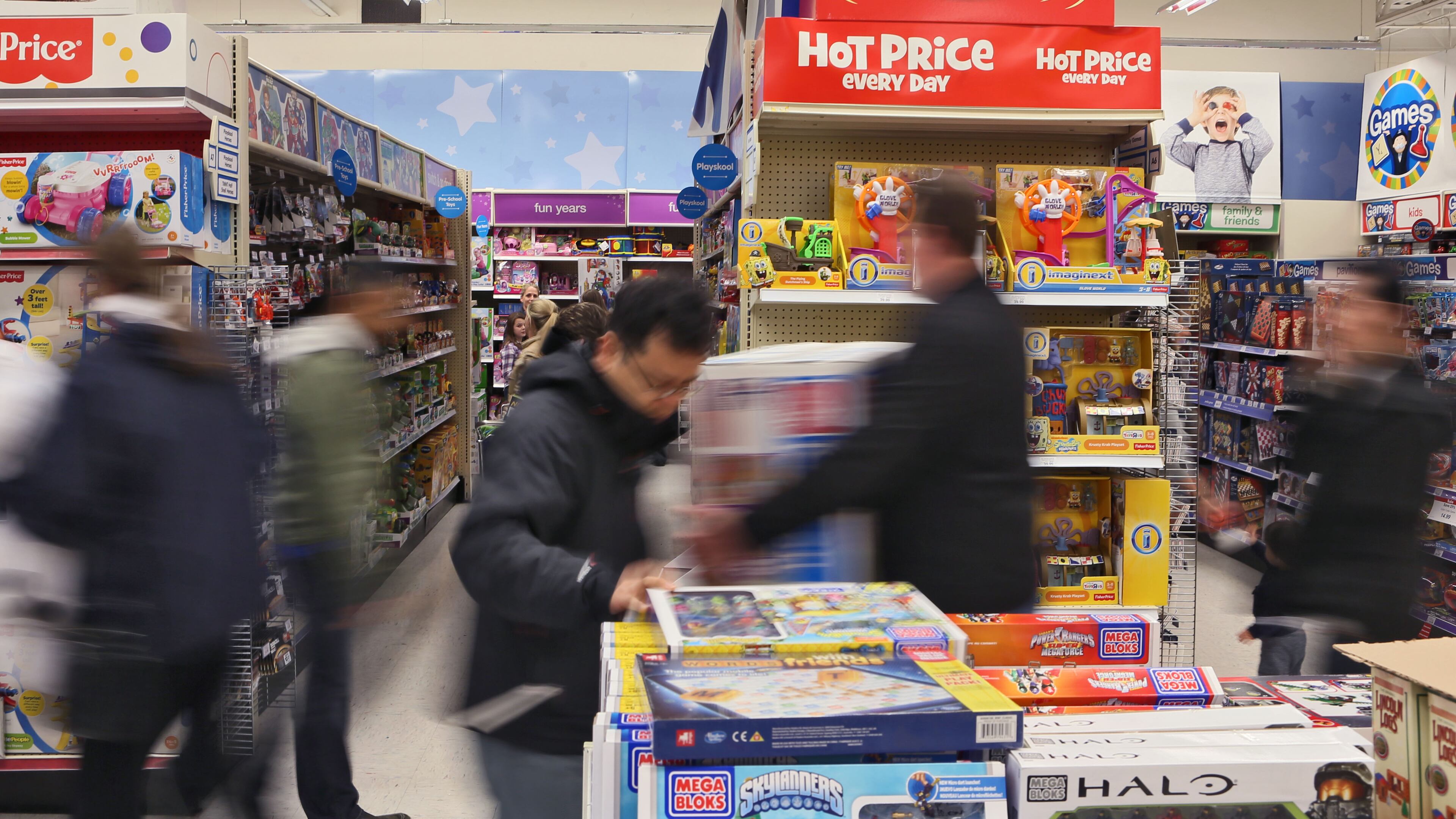 November 27, 2014 - Shoppers scamper for deals at Toy's "R" Us in Alpharetta. Black Friday shoppers got a head start with many stores opening on Thanksgiving evening. BOB ANDRES / BANDRES@AJC.COM