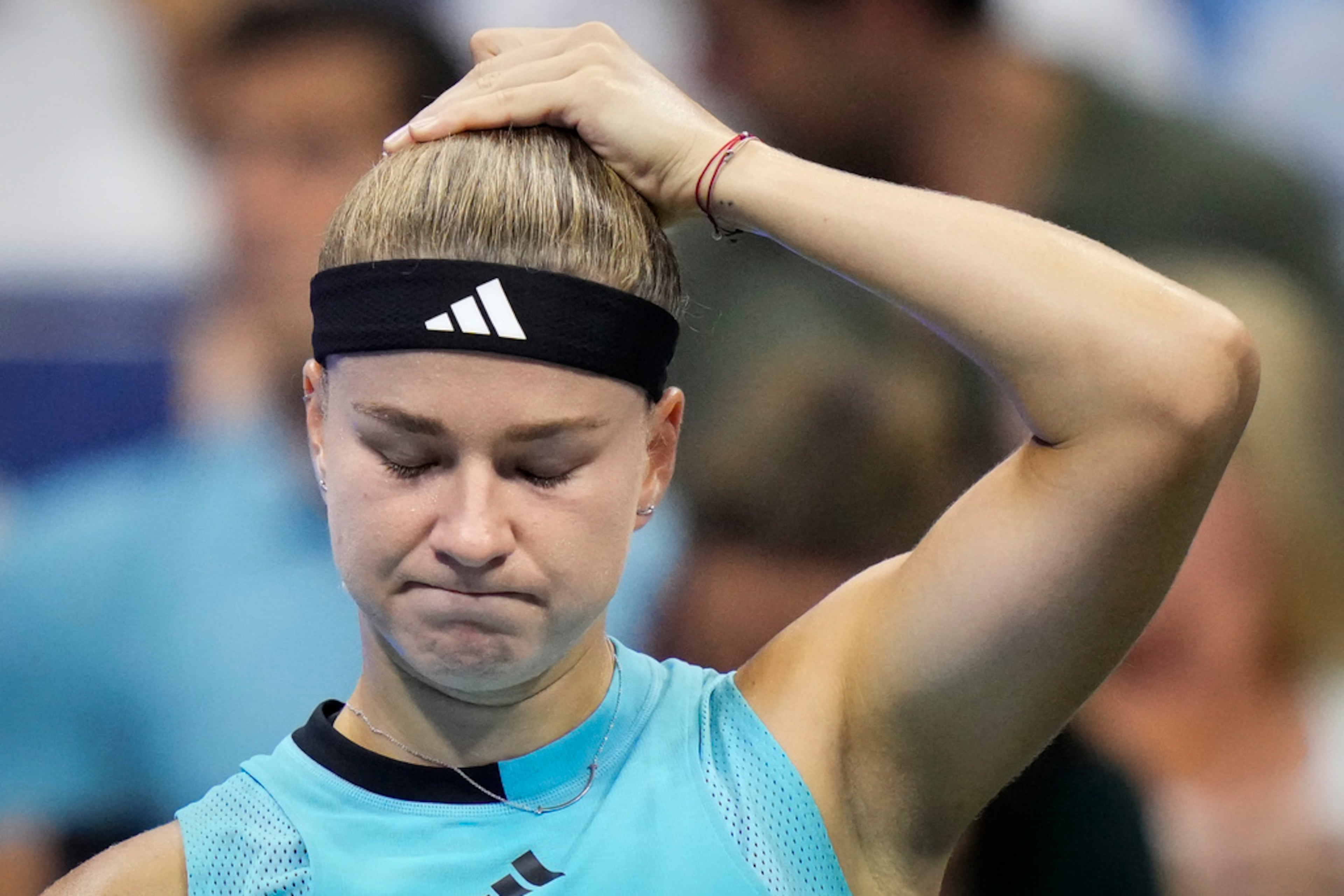 Karolina Muchova, of the Czech Republic, reacts during a match against Coco Gauff, of the United States, during the women's singles semifinals of the U.S. Open tennis championships, Thursday, Sept. 7, 2023, in New York. (AP Photo/Frank Franklin II)